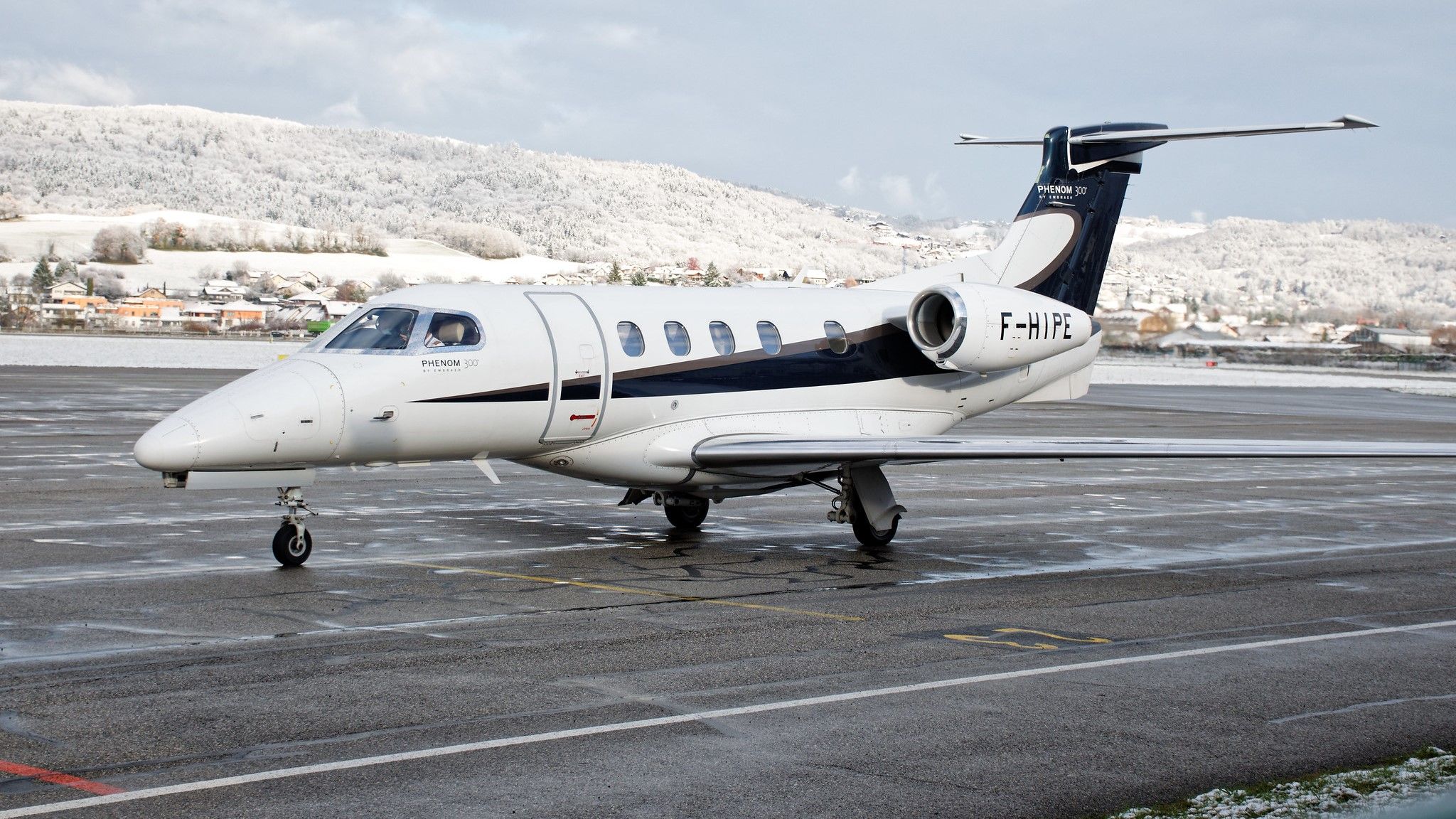 Embraer Phenom 300 Parked In Annecy