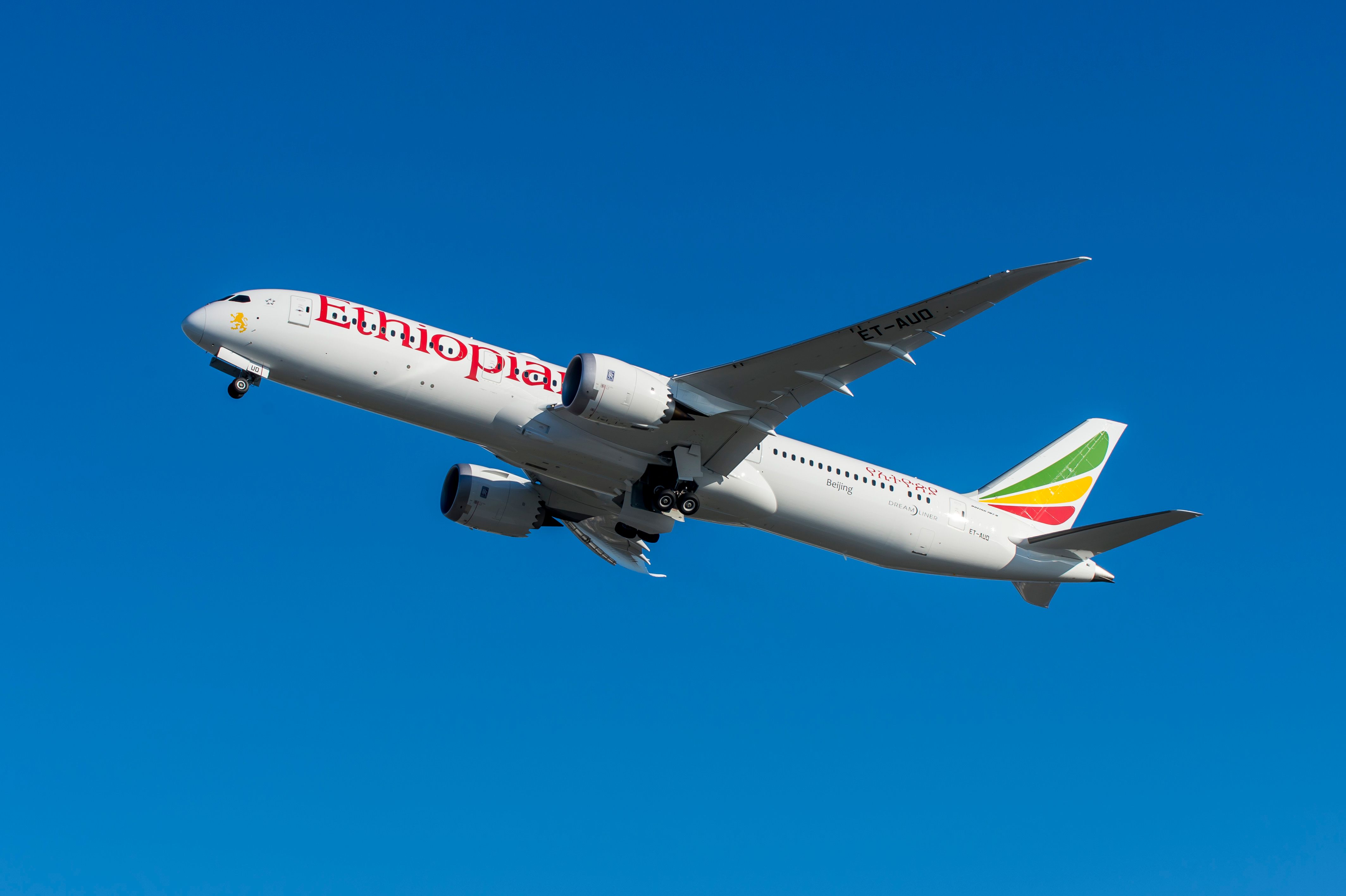 An Ethiopian Airlines Boeing 787-9 flying in the sky.