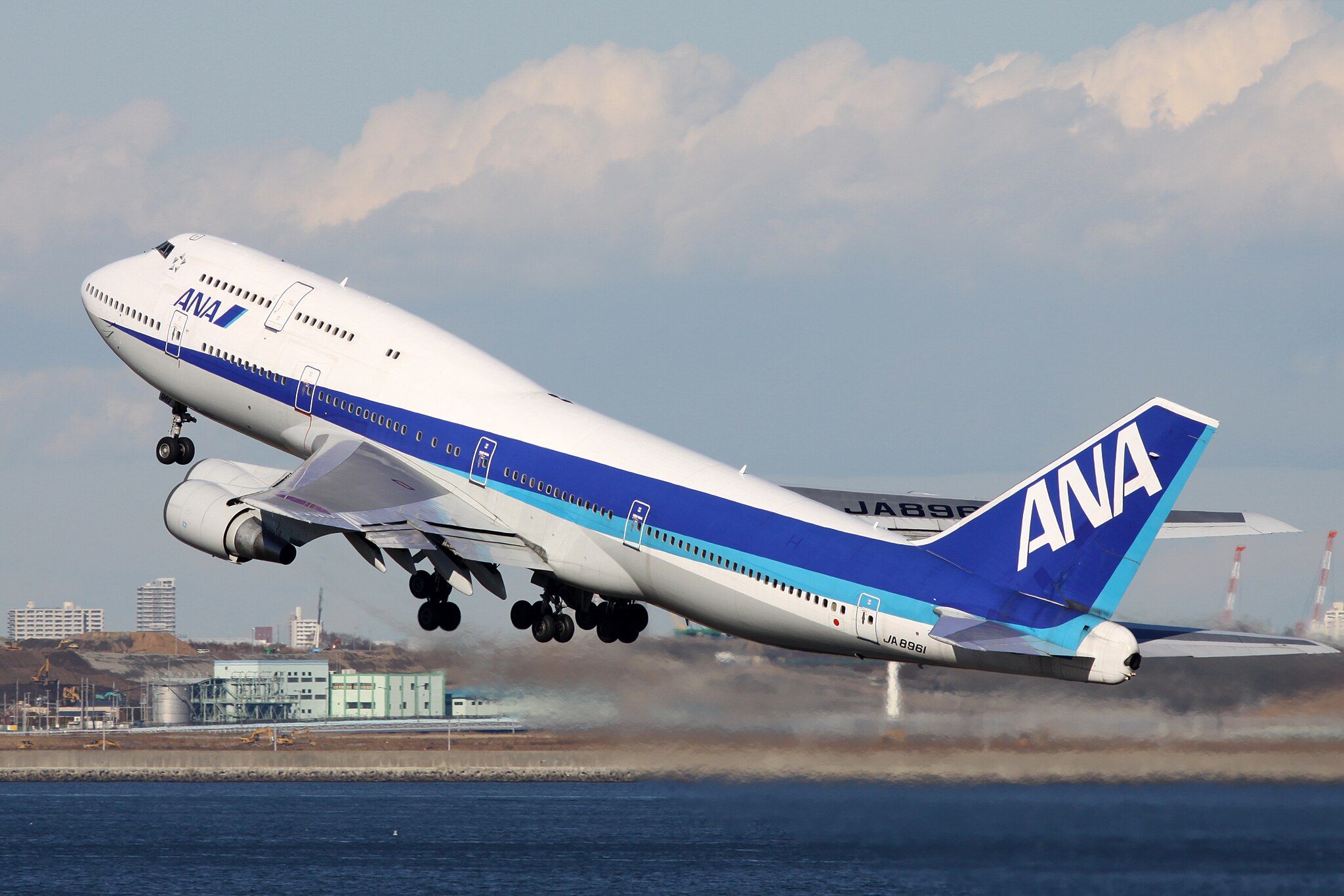 An ANA B747-400 taking off.