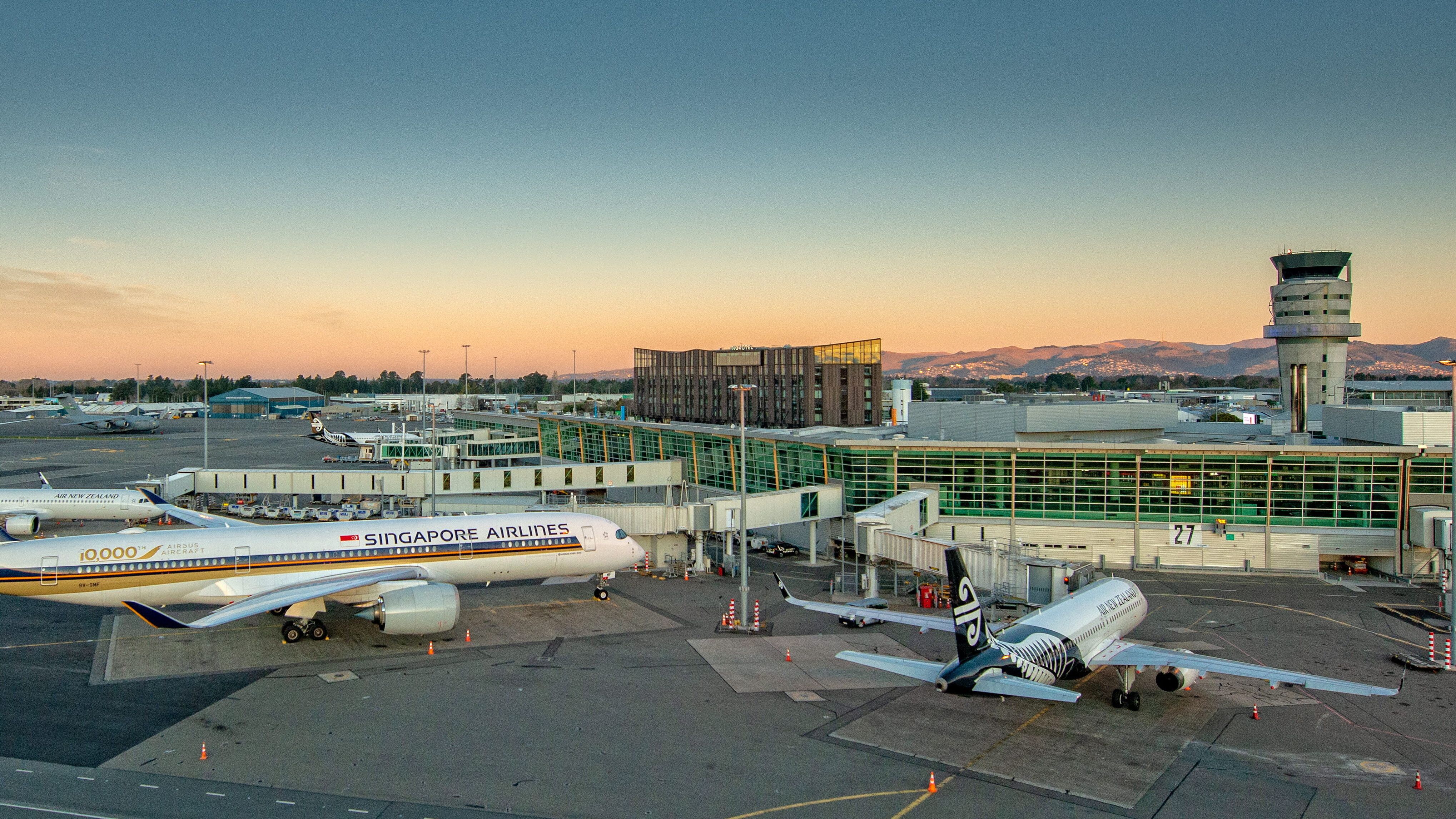 A panoramic view of Christchurch Airport at dusk.