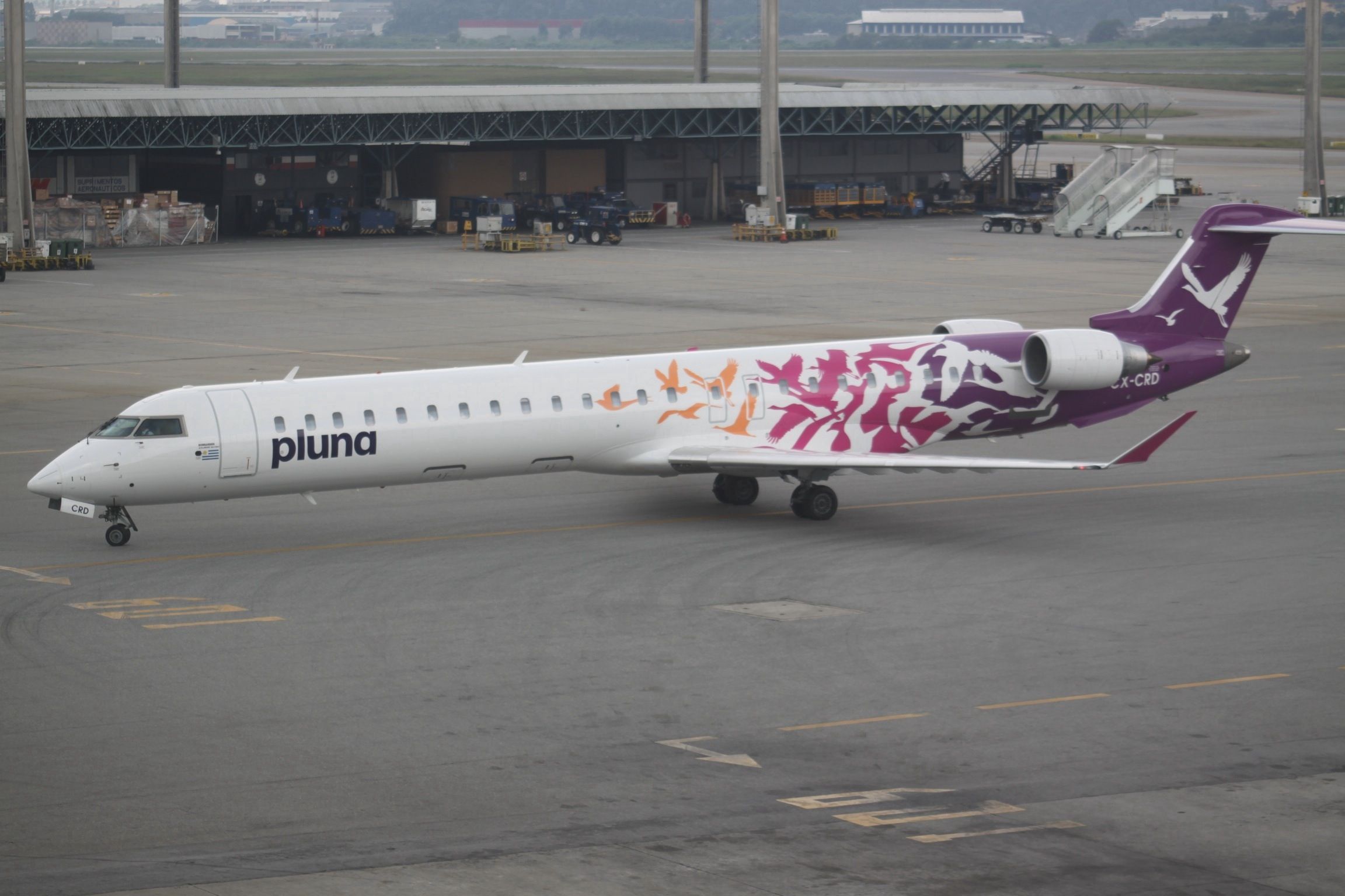 A Pluna Canadair CRJ900 taxiing to the runway.
