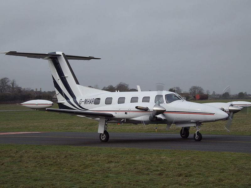 A Piper Cheyenne taxiing to the runway.