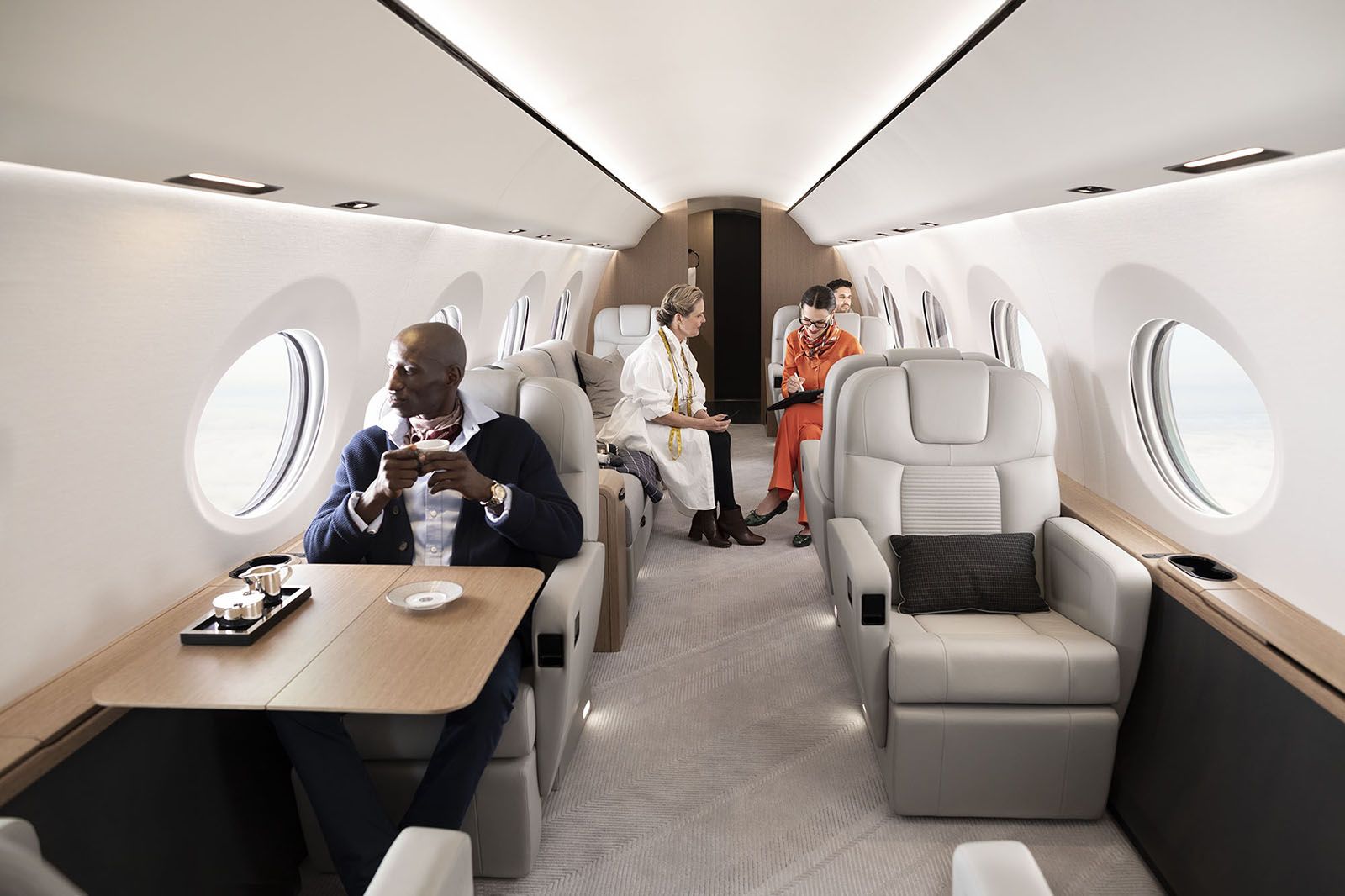 A few passengers inside a Gulfstream G 450.