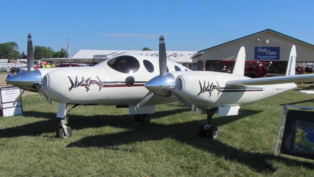 A Rutan Model 202 Boomerang parked at an airfield.