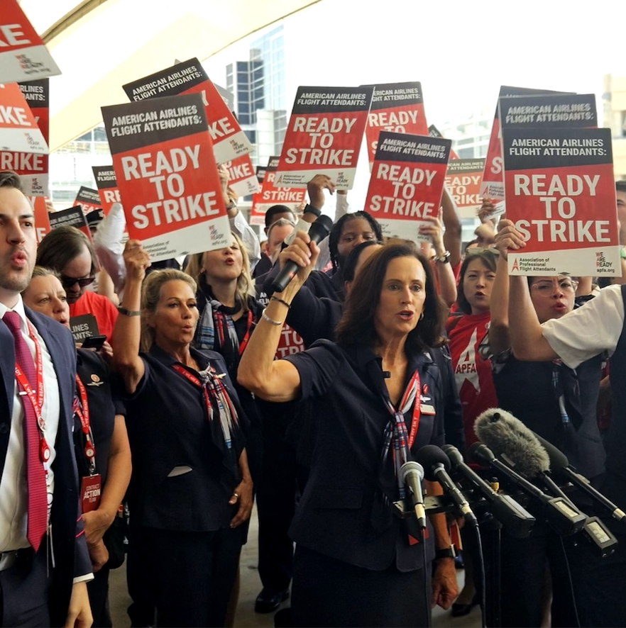 Julie Hedrick, APFA National President and members announce results of strike authorization vote on August 30, 2023