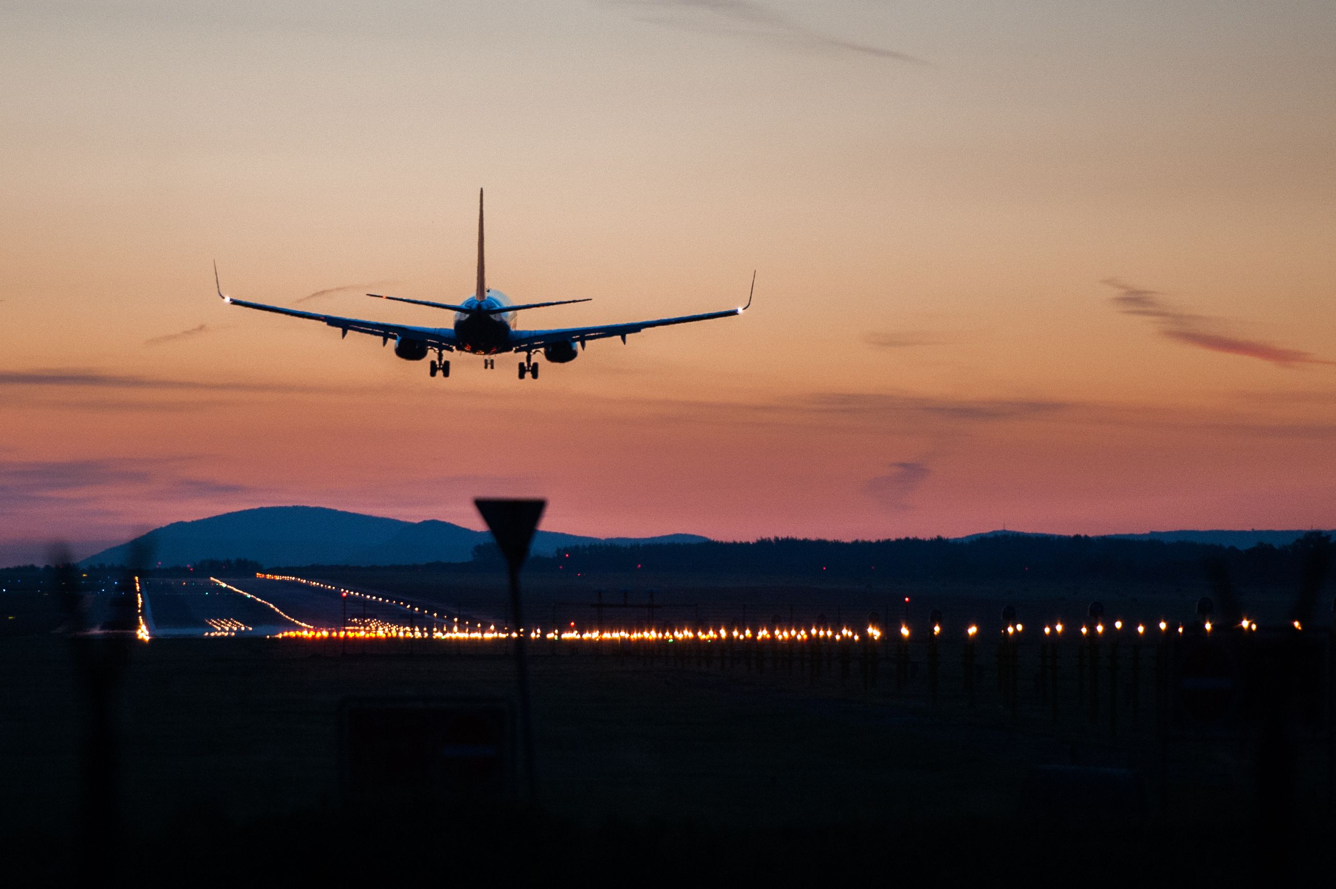 A Silhouette of a Boeing 737 Landing.
