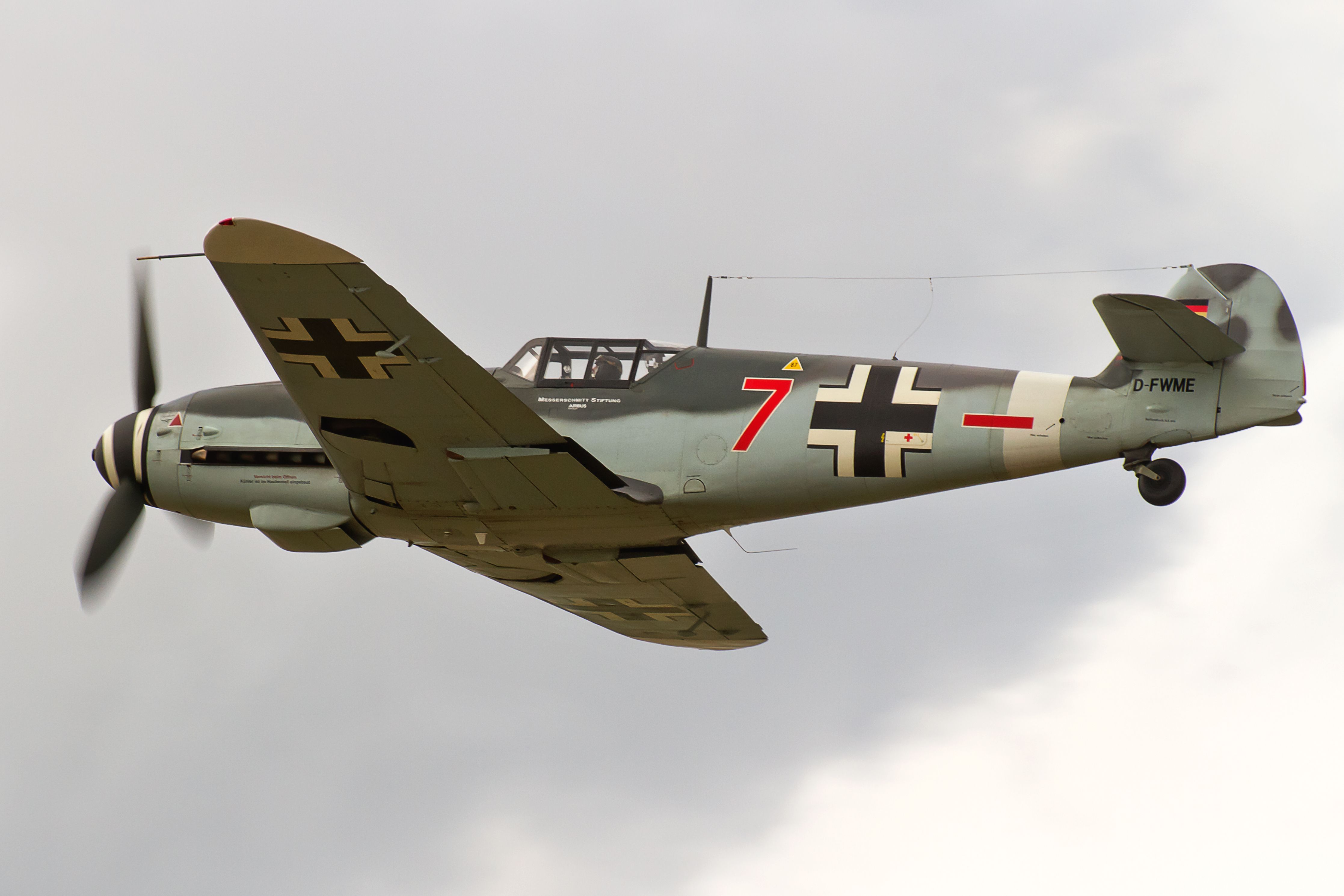 A Messerschmitt Bf 109 flying in the sky.