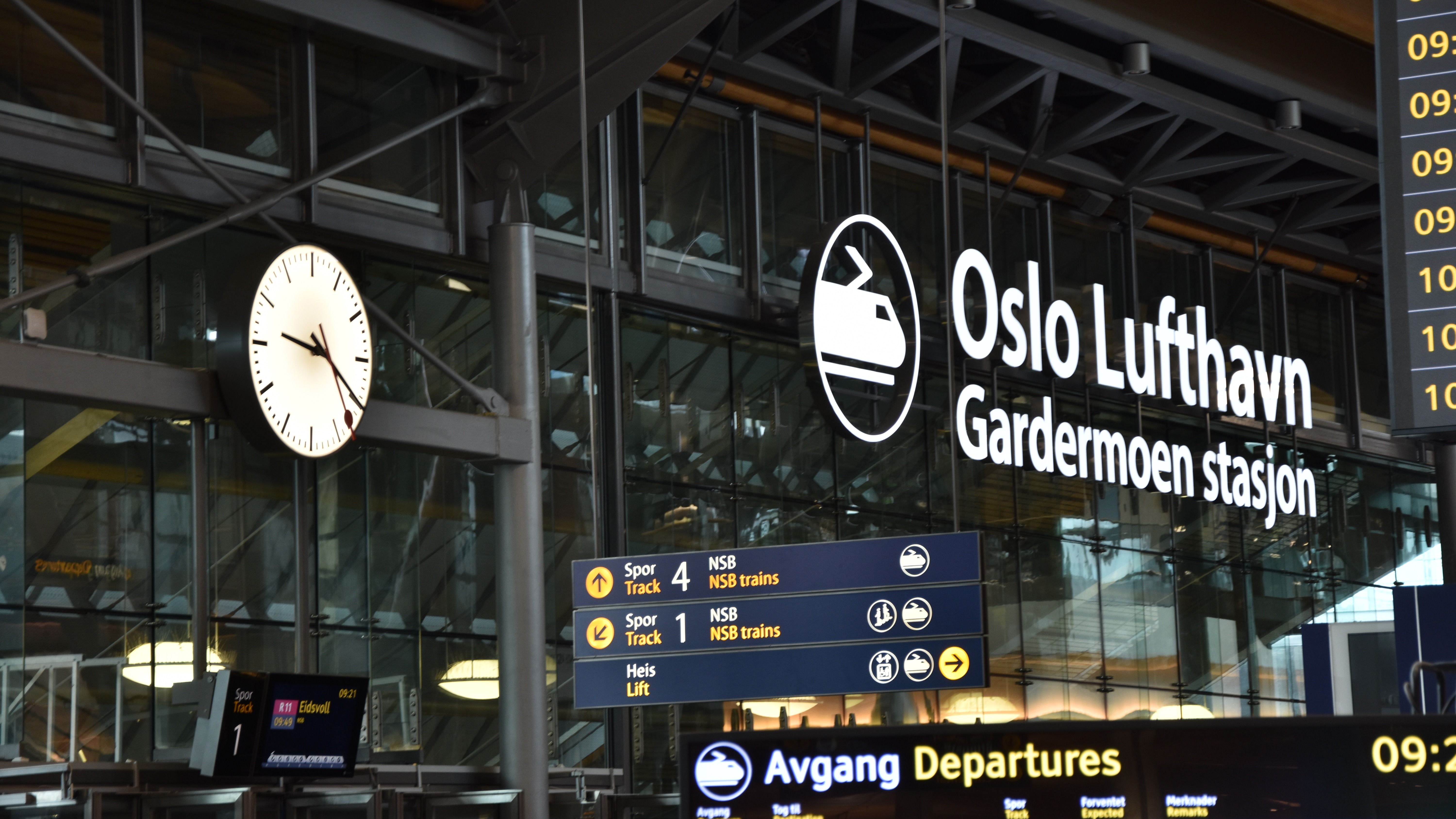 Various signage outside of Oslo Airport.