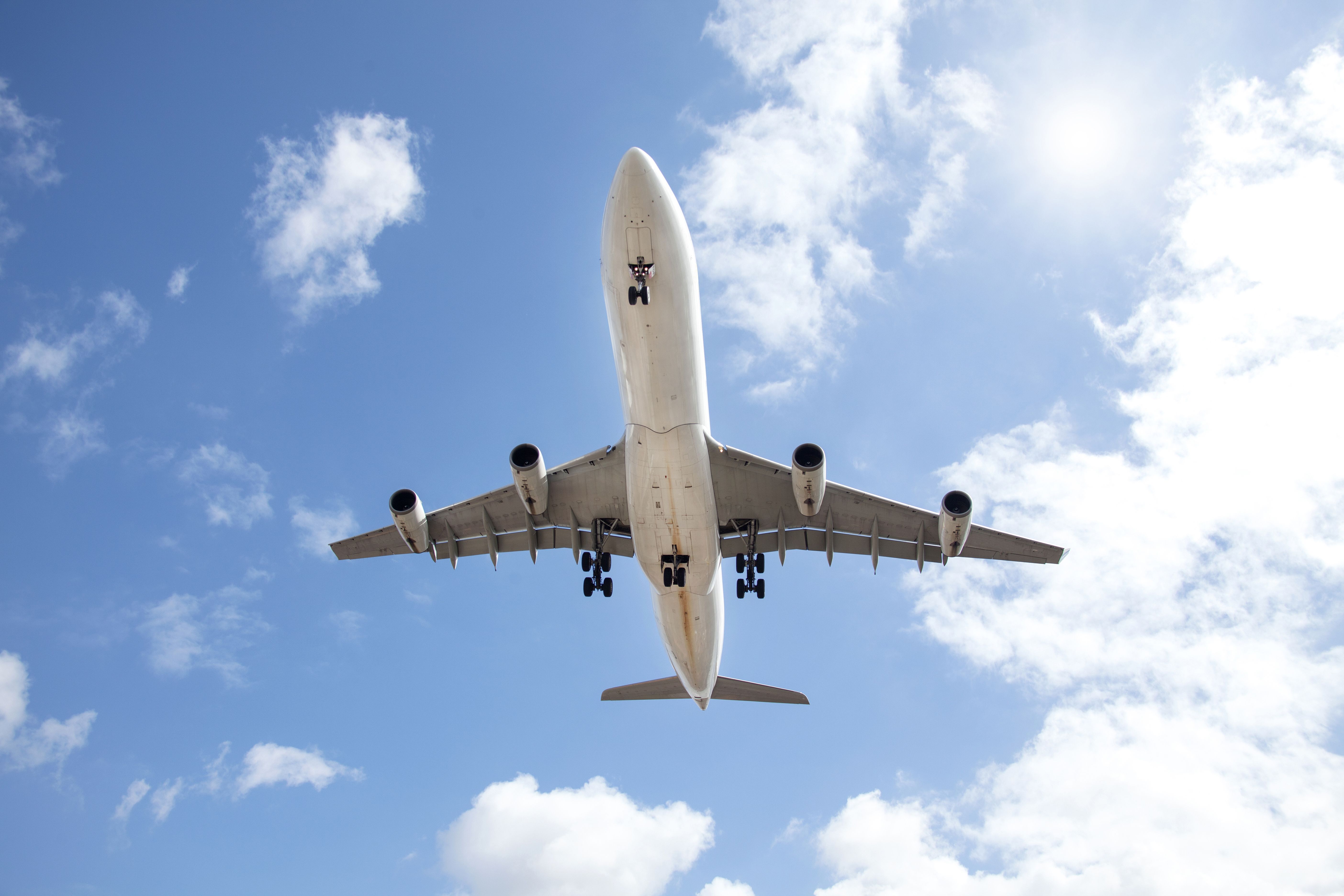 An Airbus A340 flying overhead.