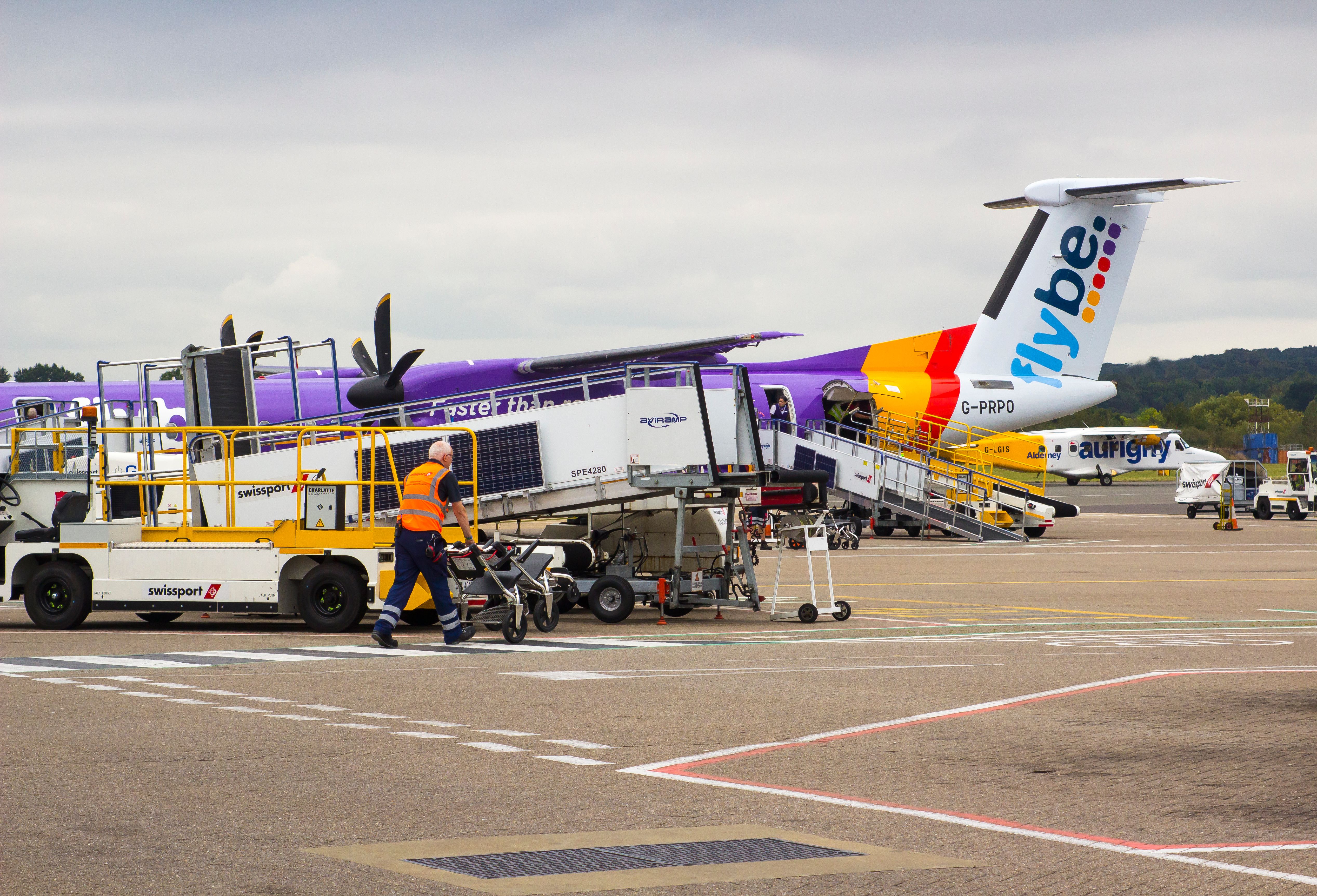Flybe plane with baggage handler