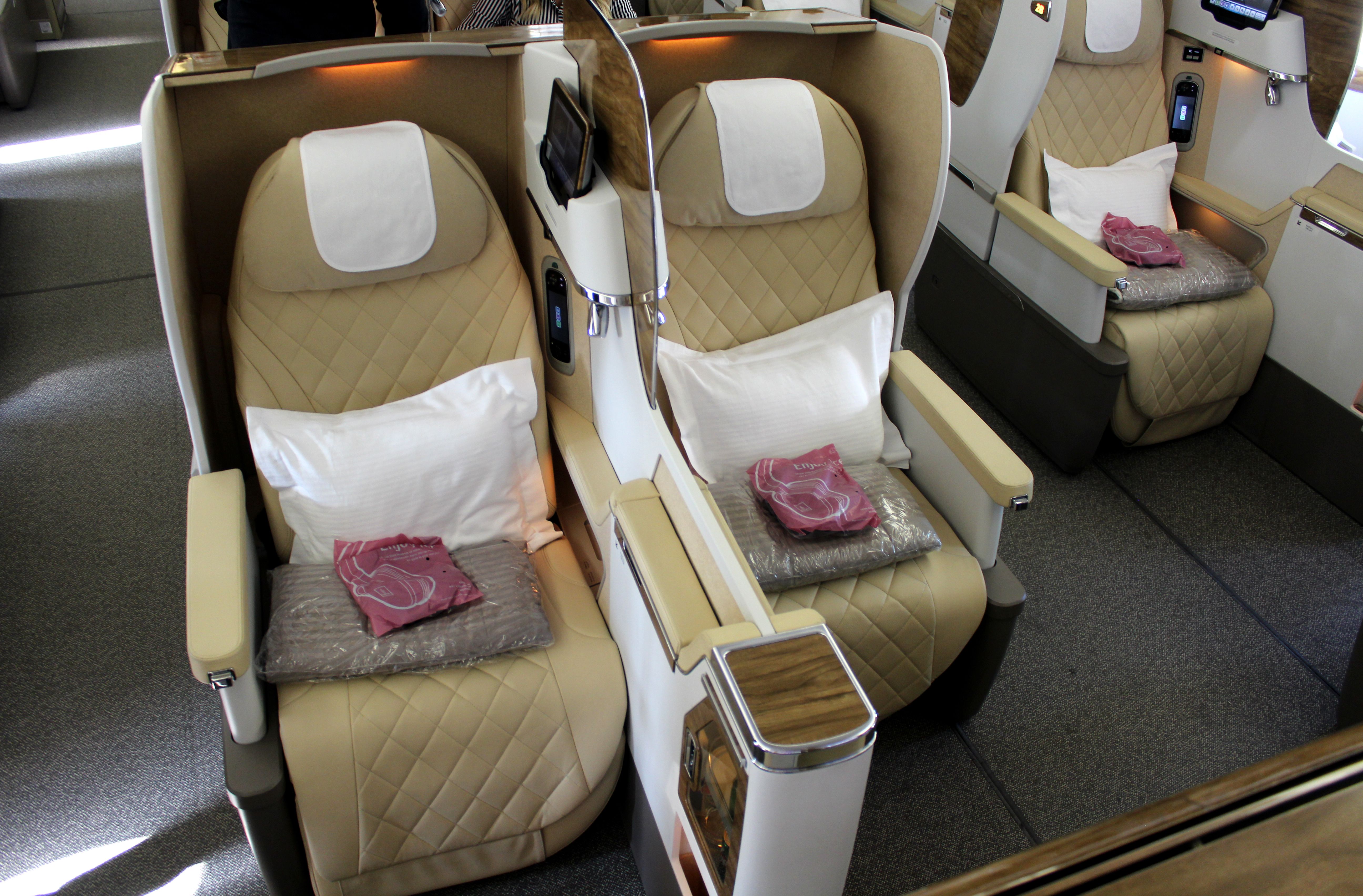 A couple of Emirates Boeing 777 business class seats.