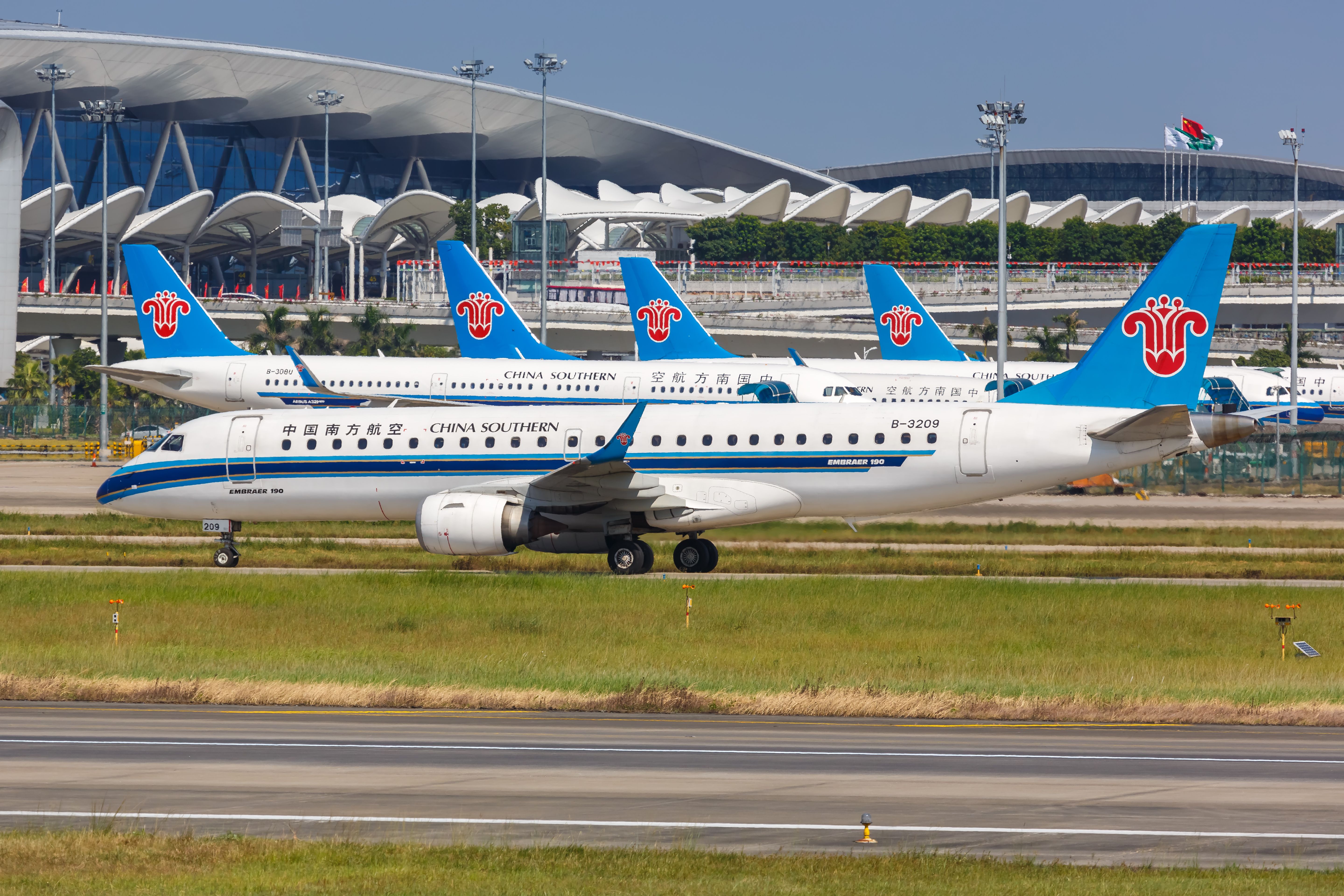 A China Southern Airlines Embraer 190 taxiing at Guangzhou airport.