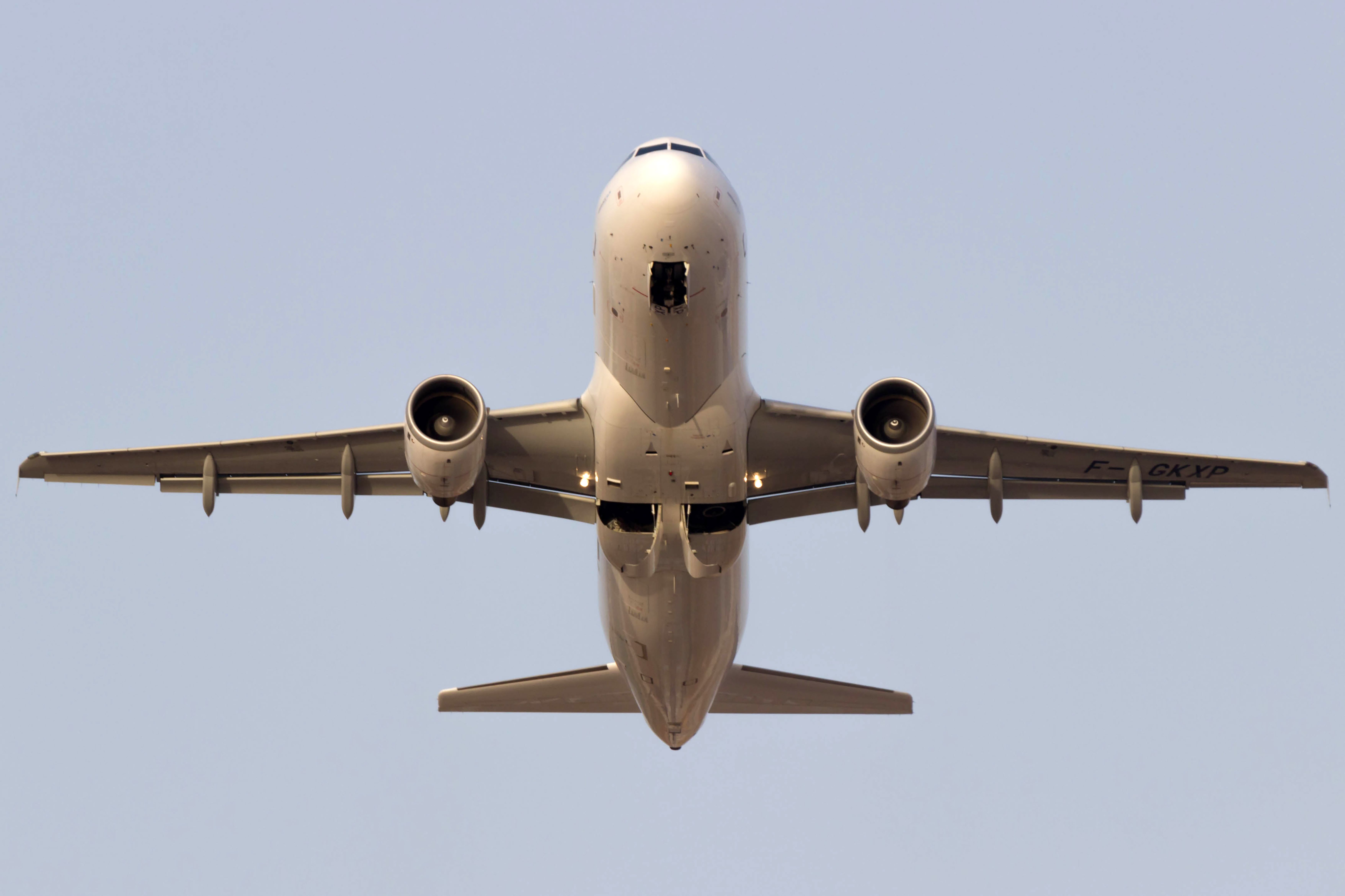 An aircraft flying overhead.