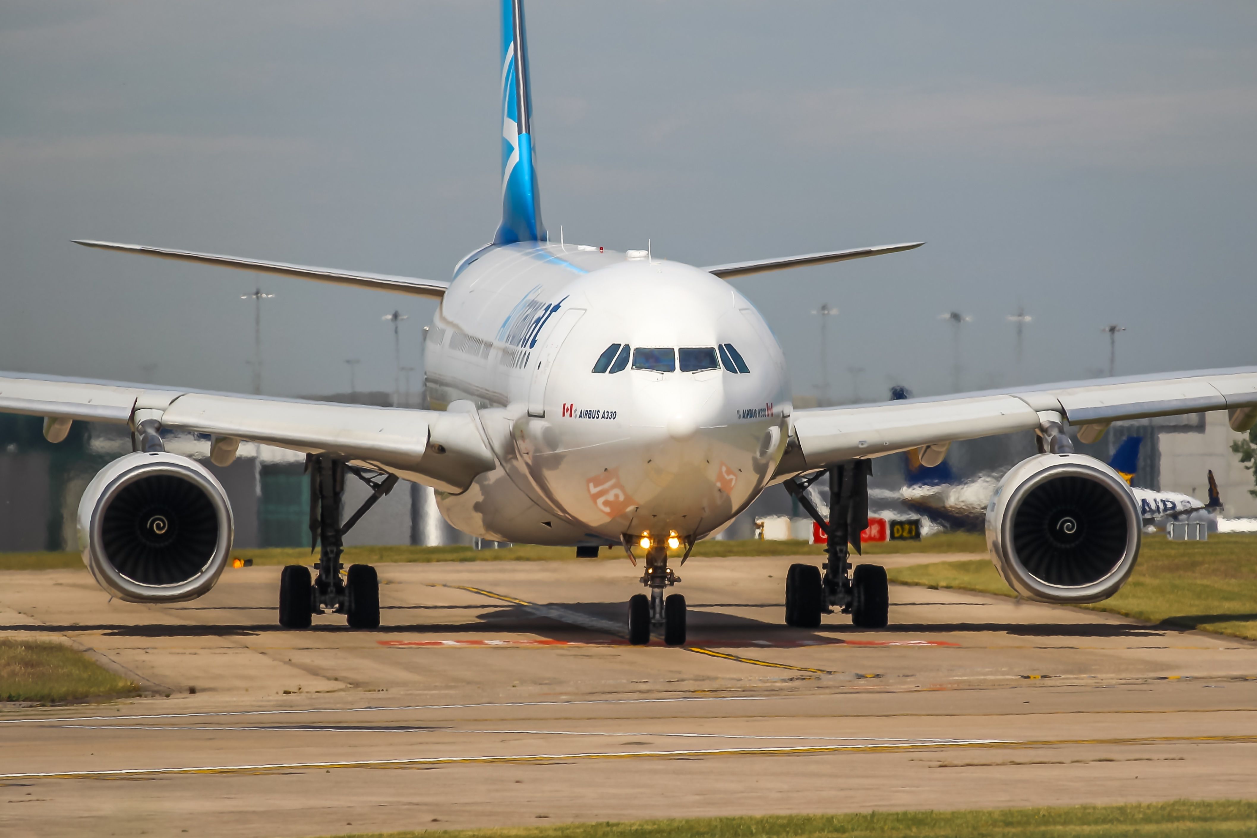 Air Transat Airbus A320 on the runway at Manchester Airport