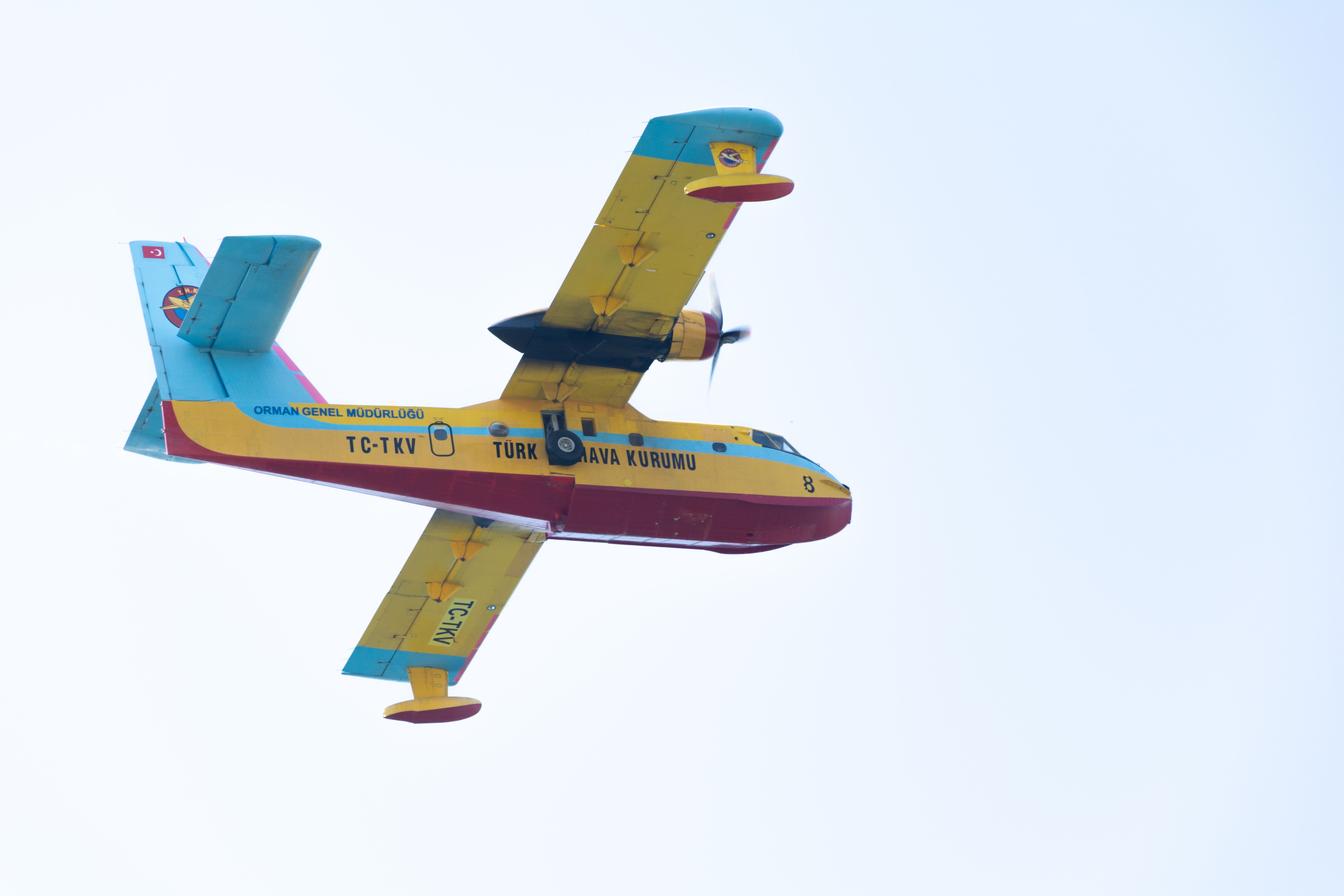 A Firefighting aircraft flying in the sky.