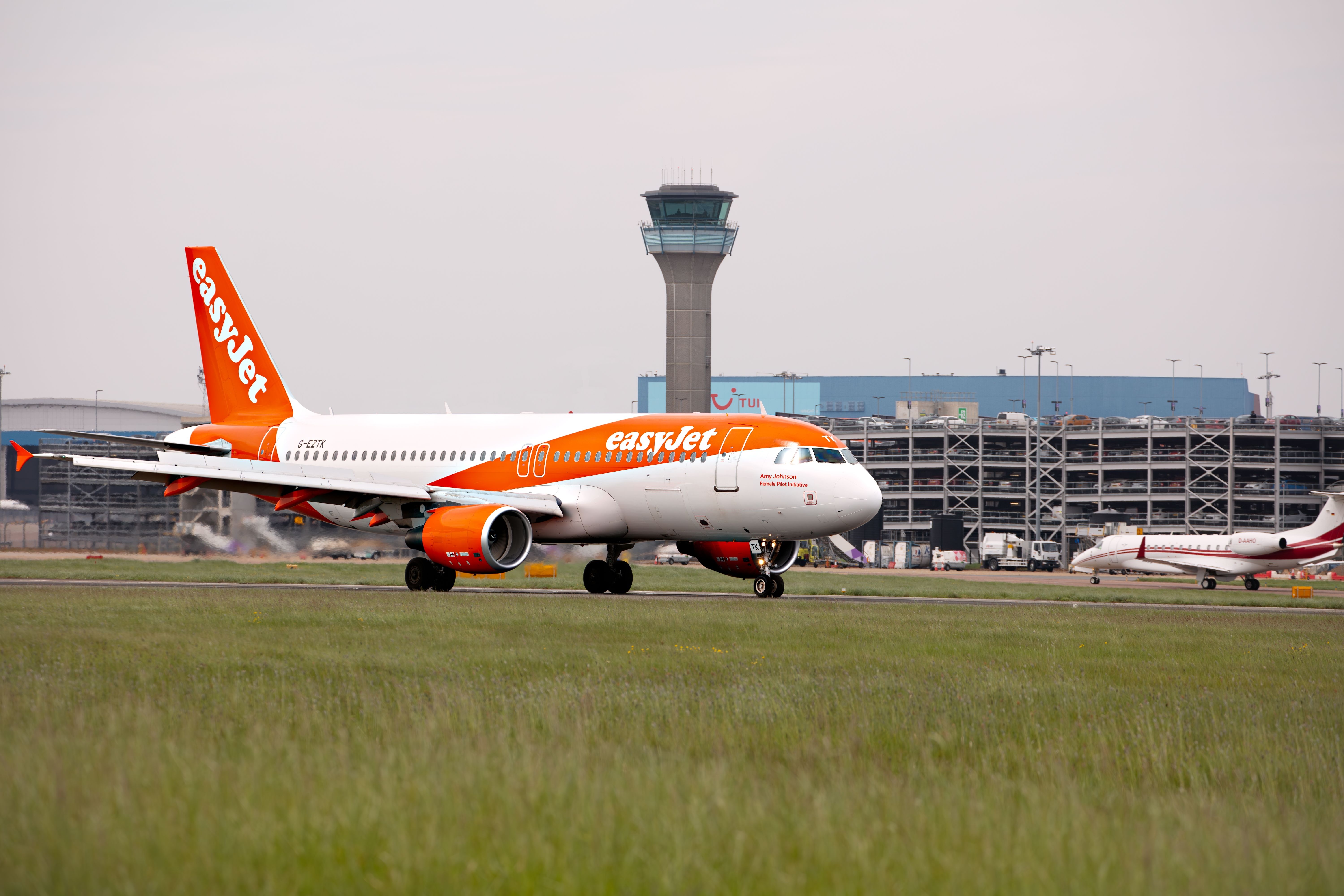 easyJet Airbus A320 Taxiing Past ATC Tower At London Luton Airport