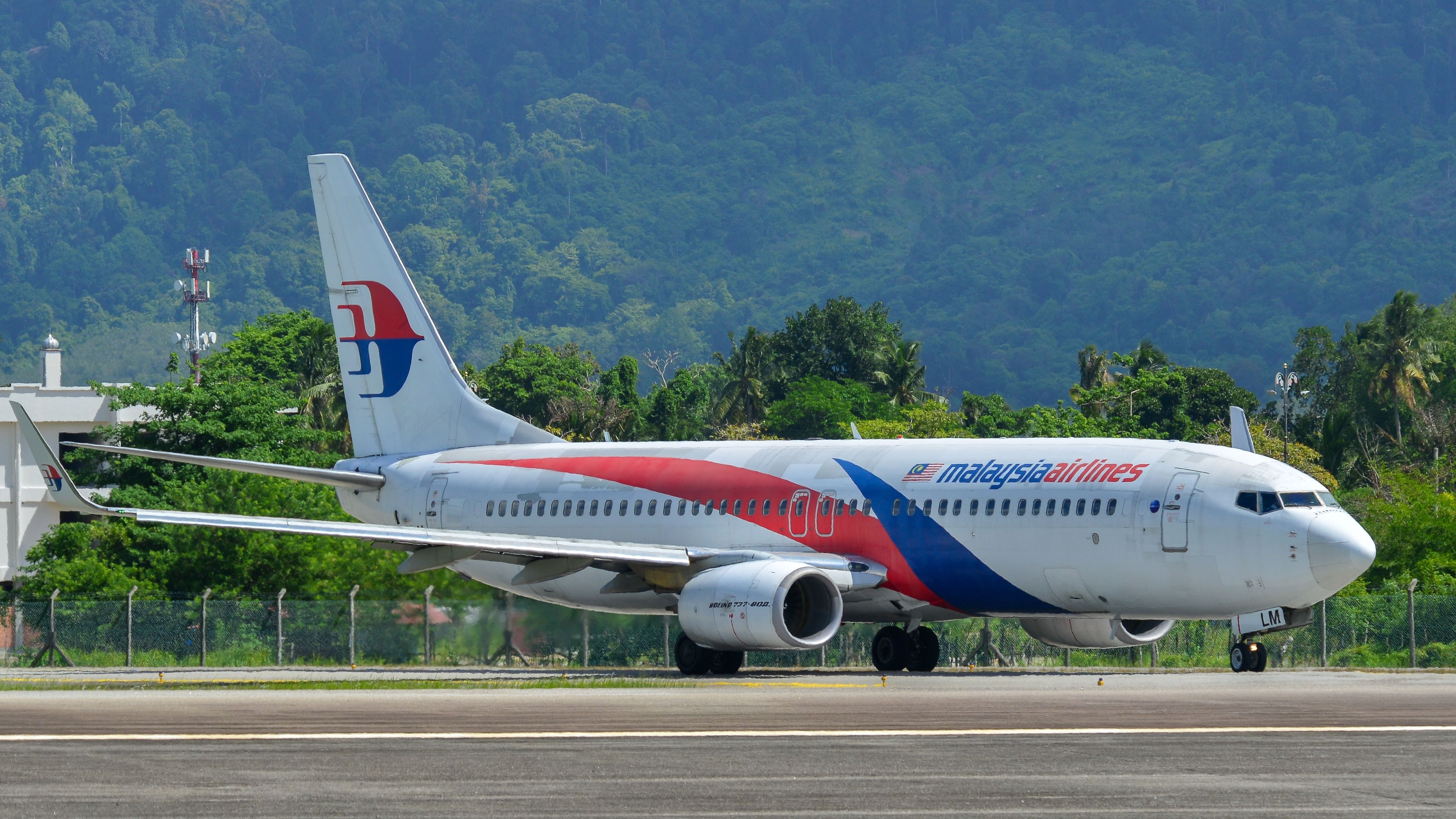 Malaysia Airlines Boeing 737-800 taxiing for takeoff from Langkawi Airport.