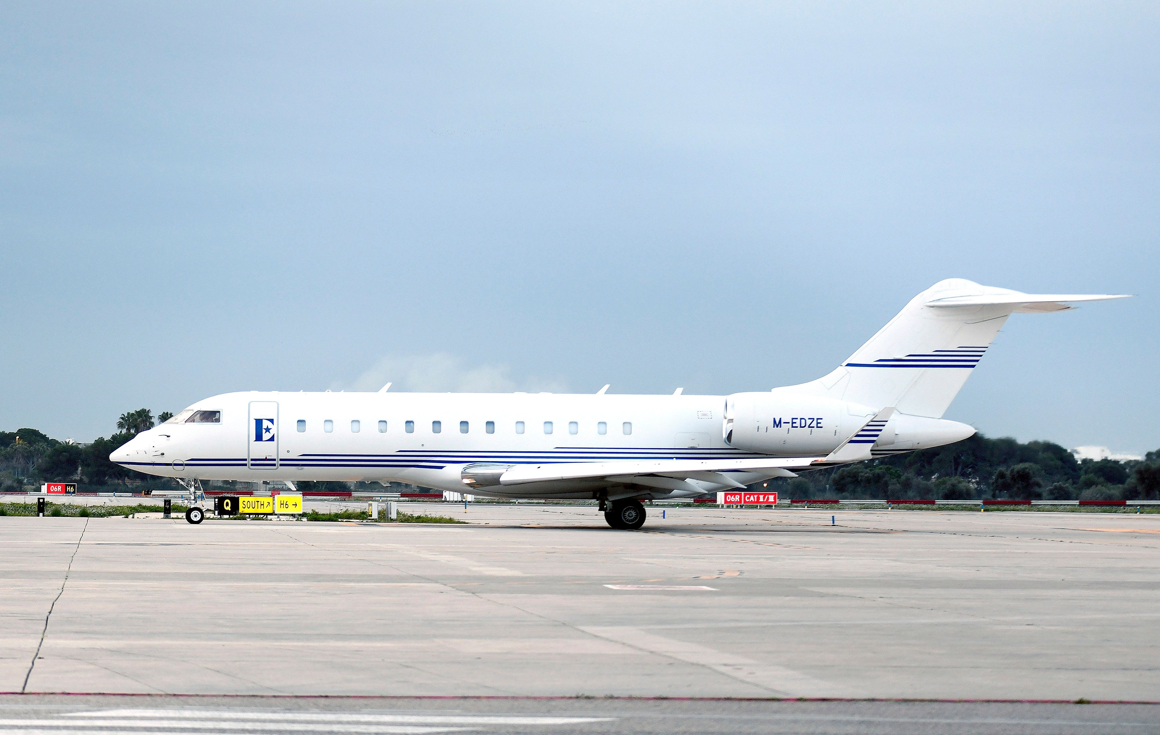 Sir Elton John's private plane taxiing at an airport.