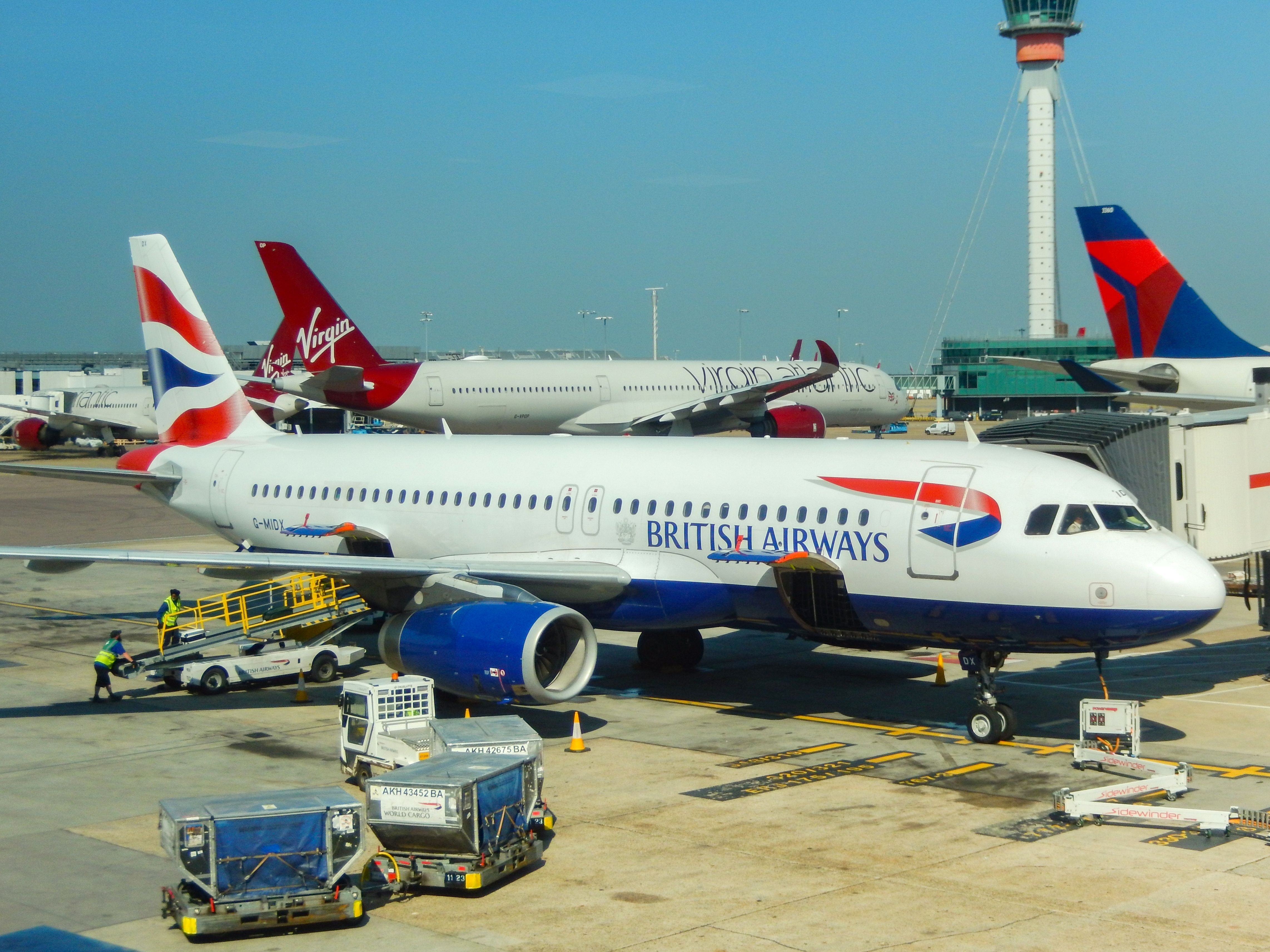 British Airways Airbus A320 (registration G-MIDX) at the terminal in Heathrow Airport