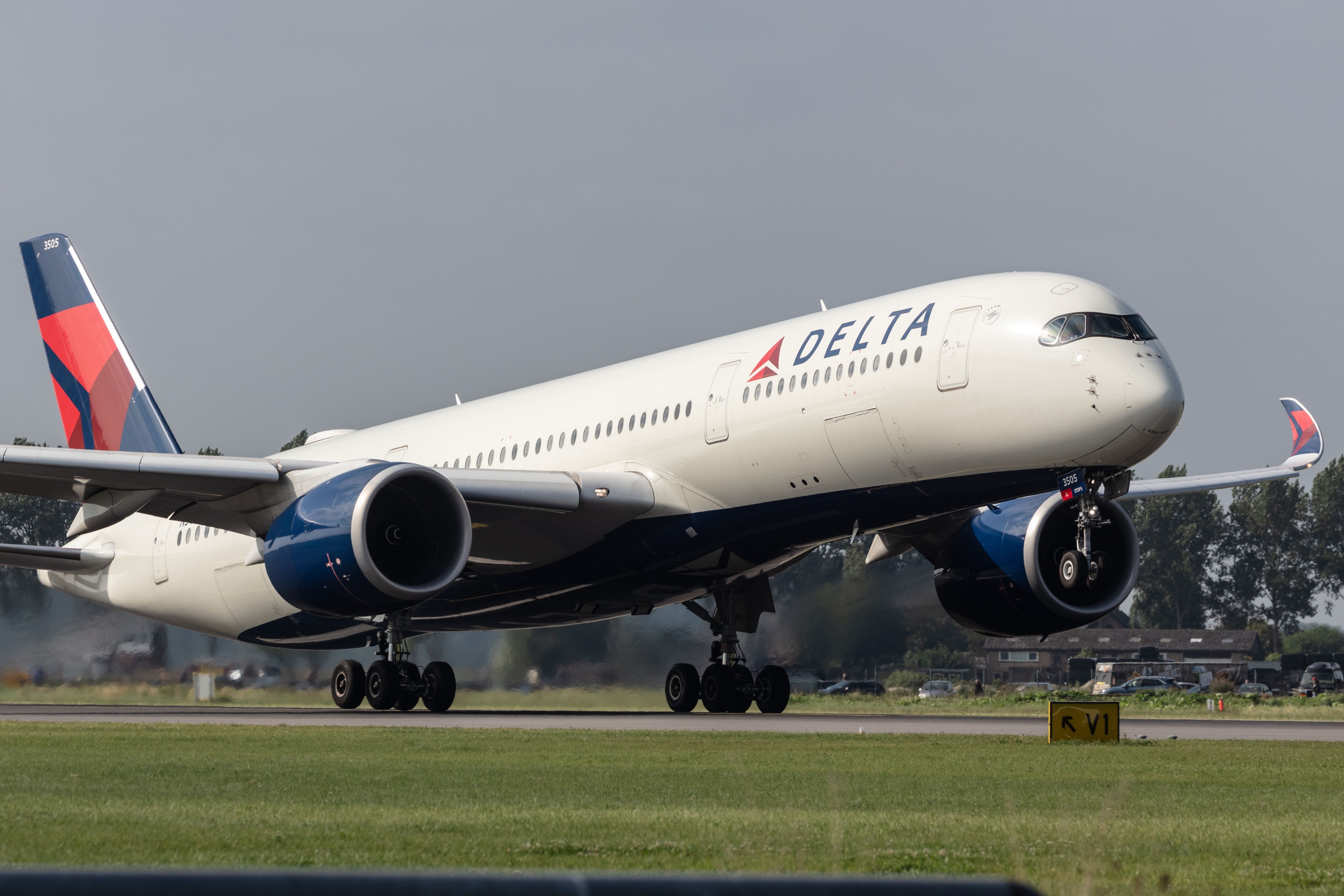 A Delta Air Lines Airbus A350-900 just about to take off.