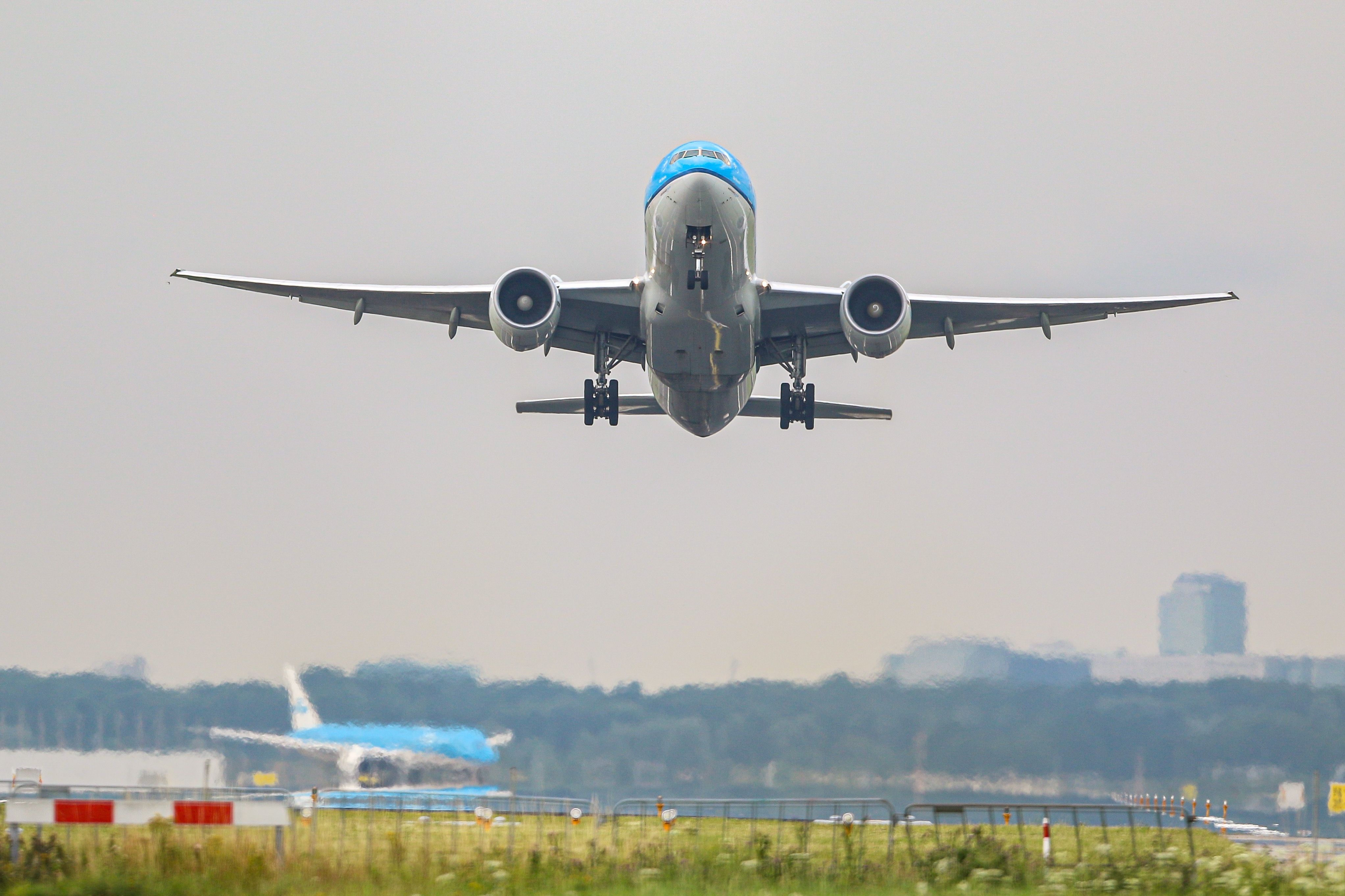 KLM aircraft landing at Amsterdam Schiphol Airport