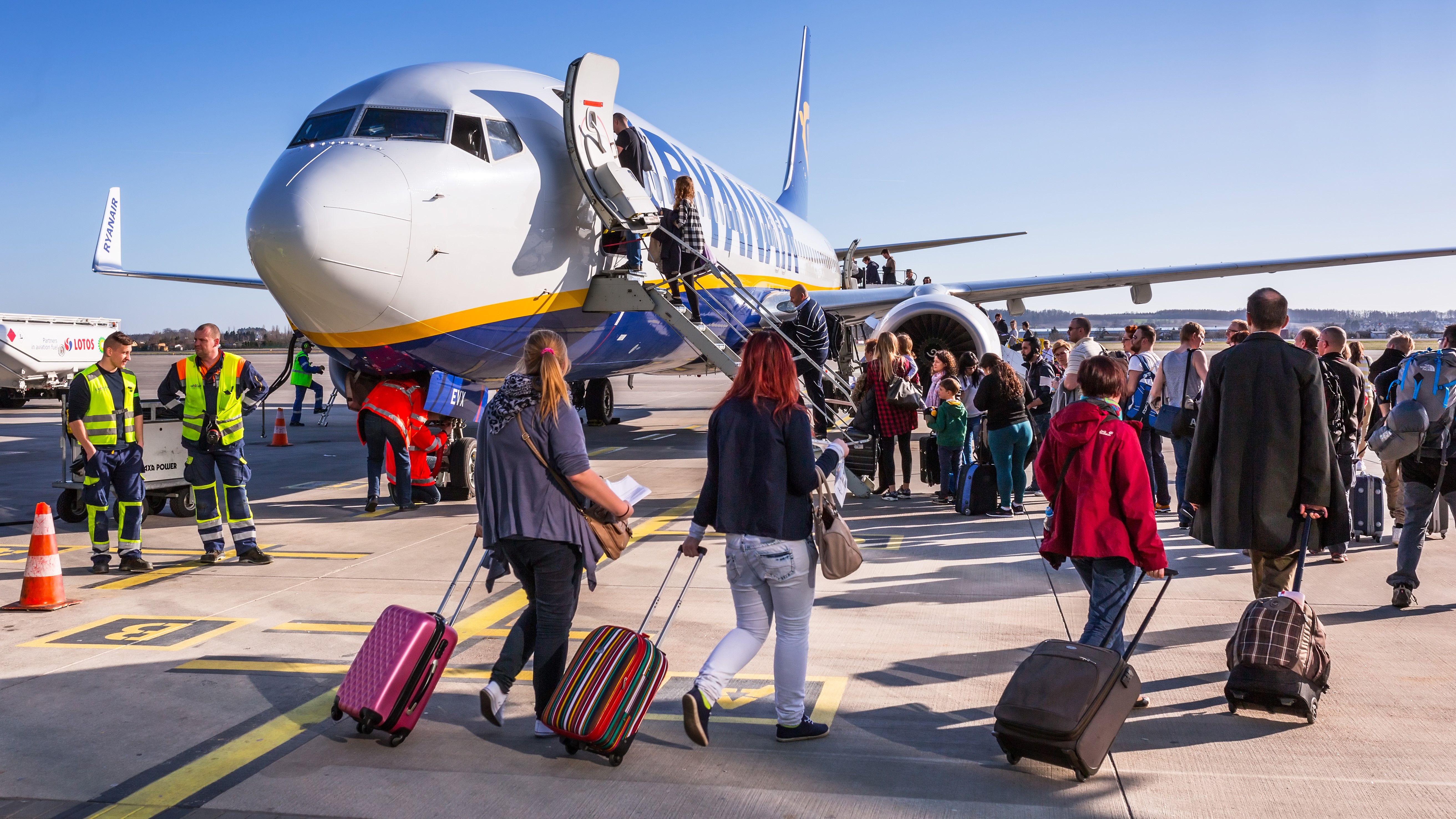 Passengers boarding a Ryanair flight in Gdansk via air stairs