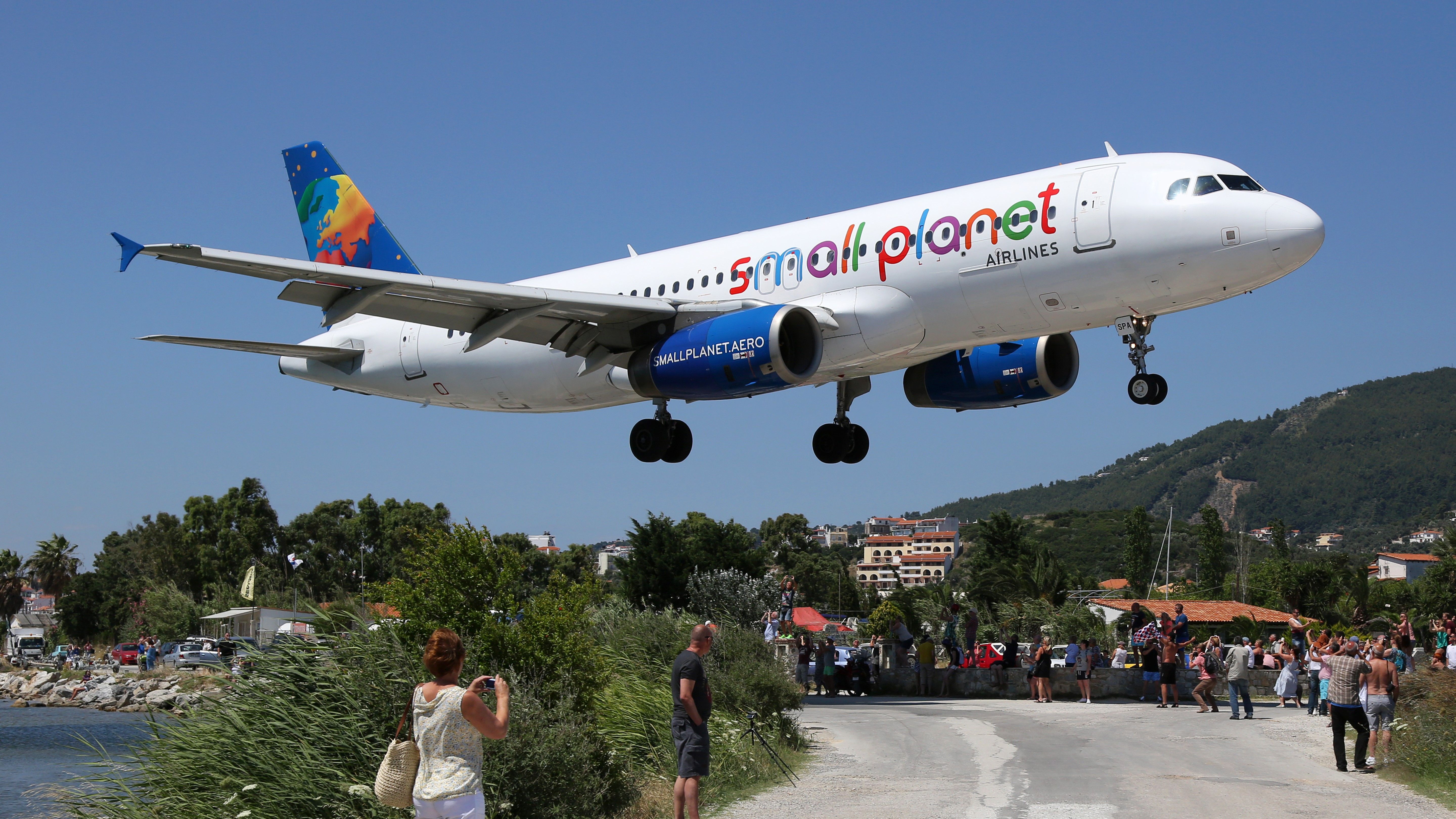 A Small Planet Airbus A320 Landing In Skiathos.
