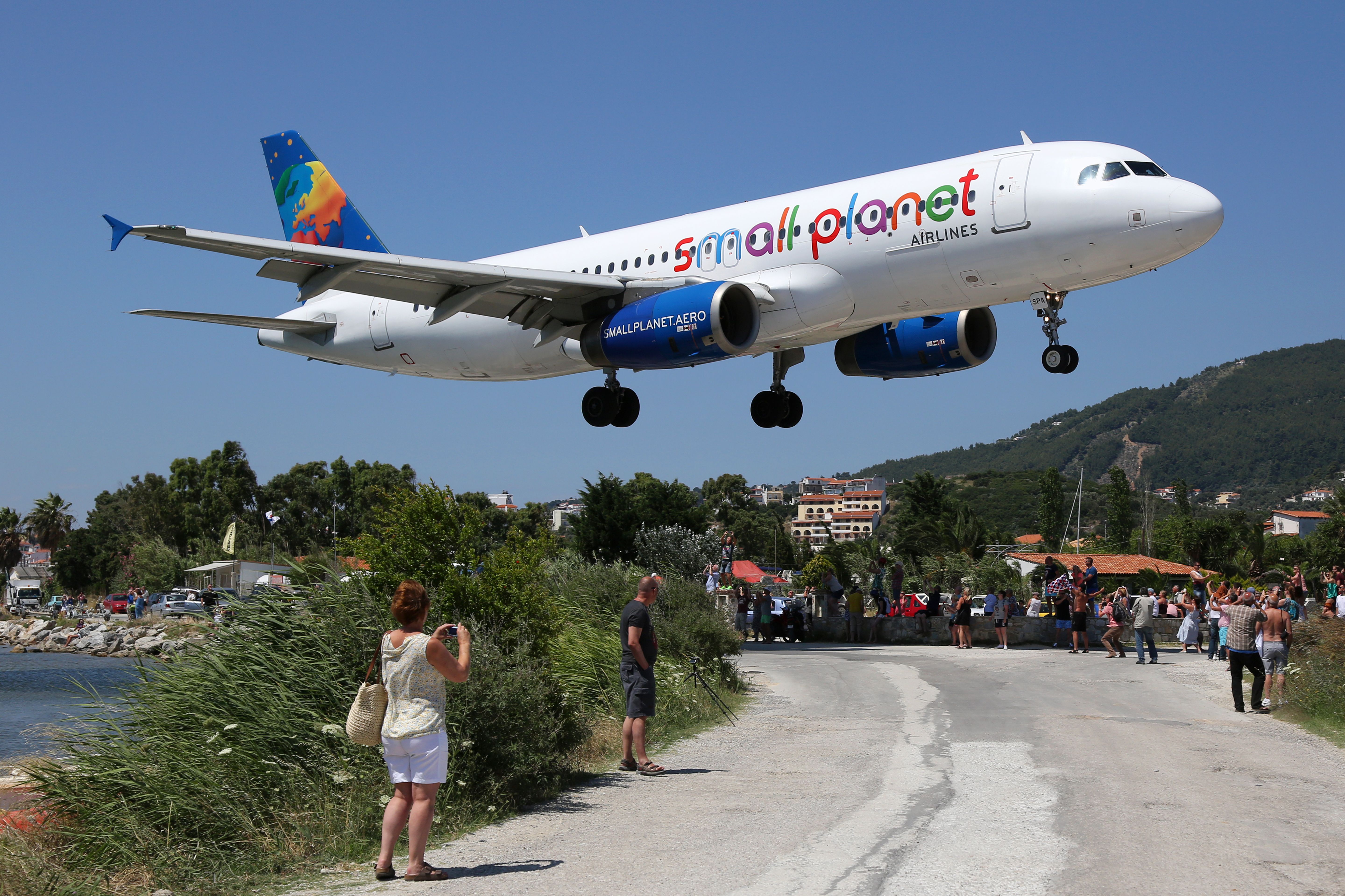 A Small Planet Airbus A320 Landing In Skiathos.