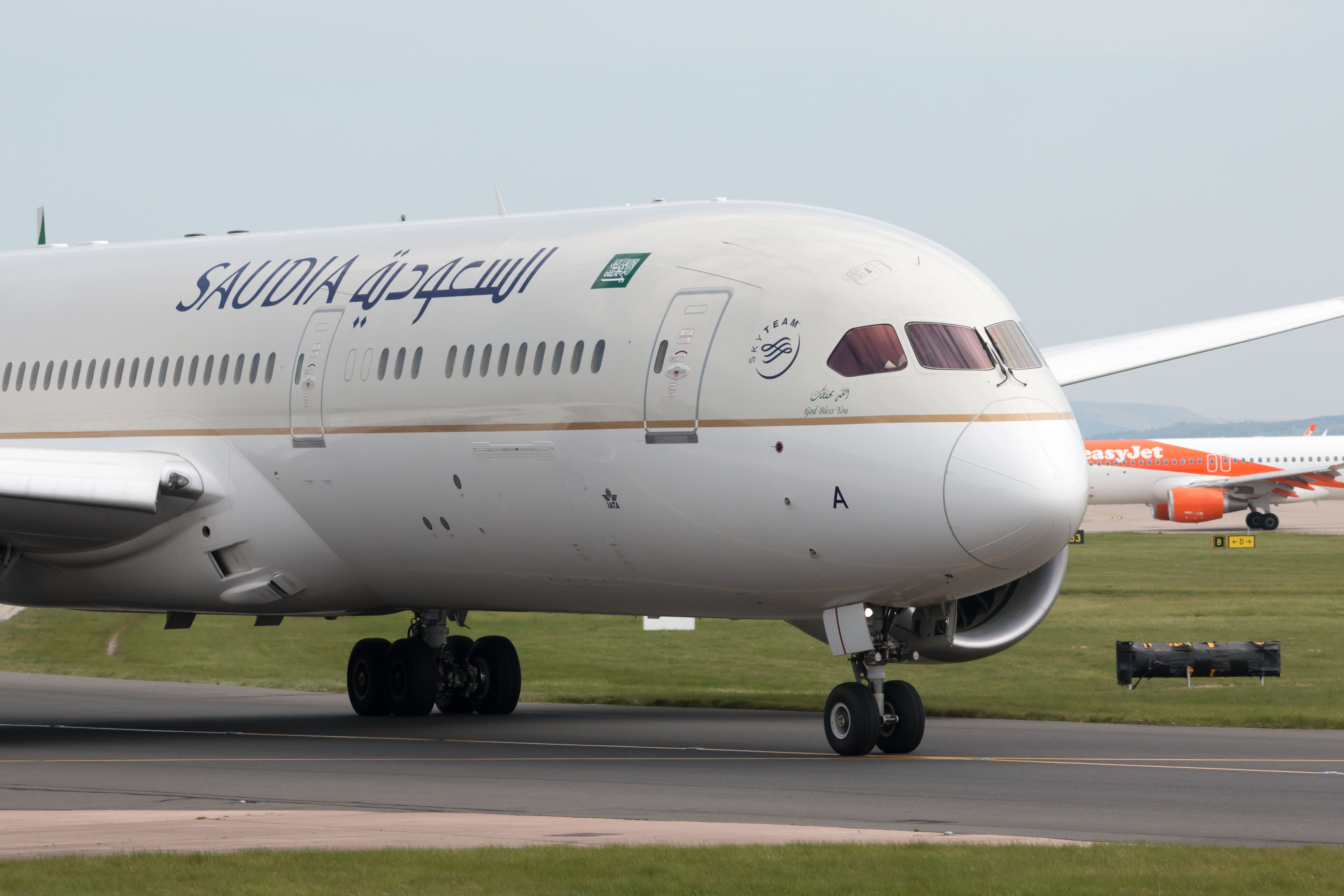 Saudia Boeing 787-9 Dreamliner taxiing at Manchester International Airport.