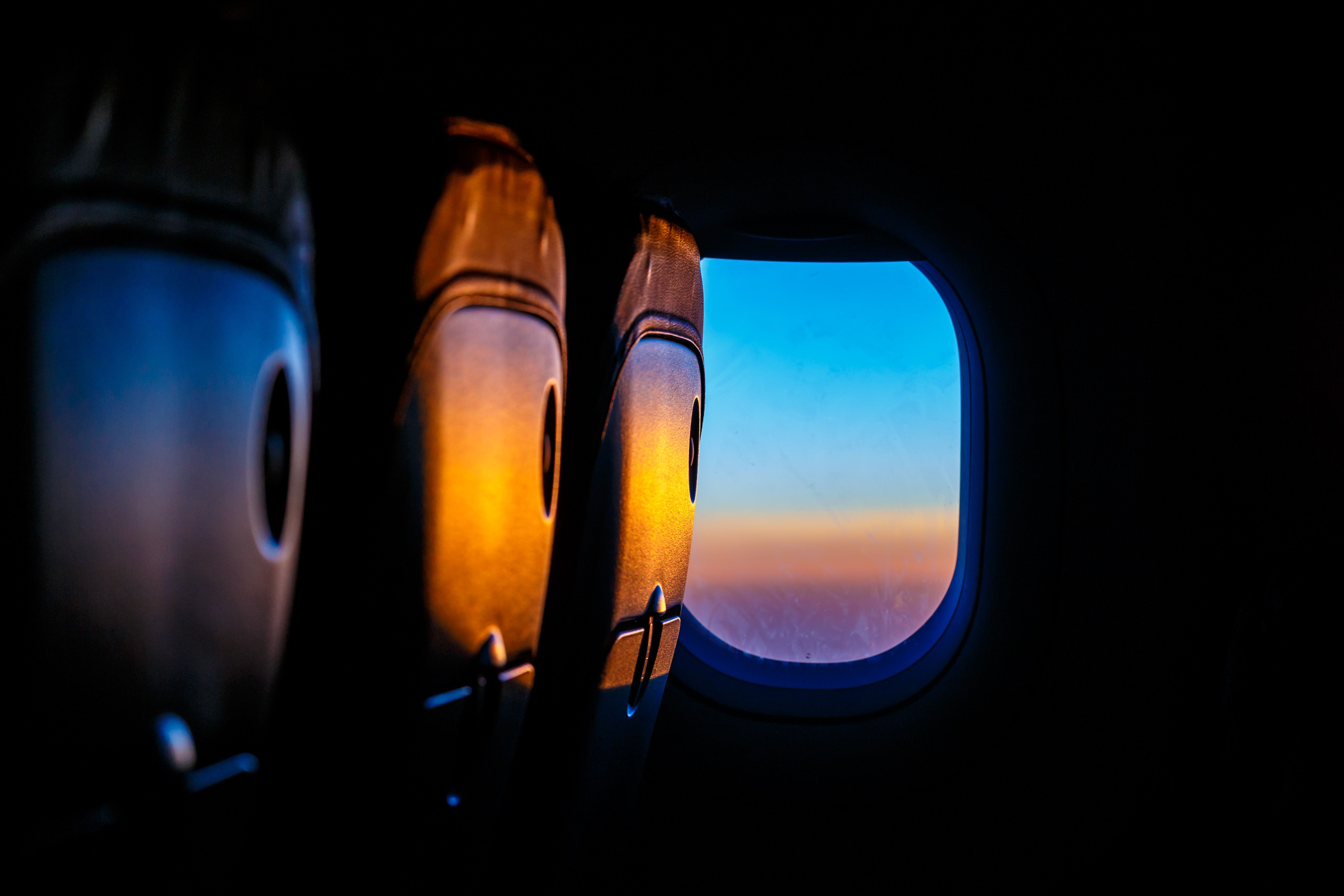 A camera looking out the window of an aircraft.