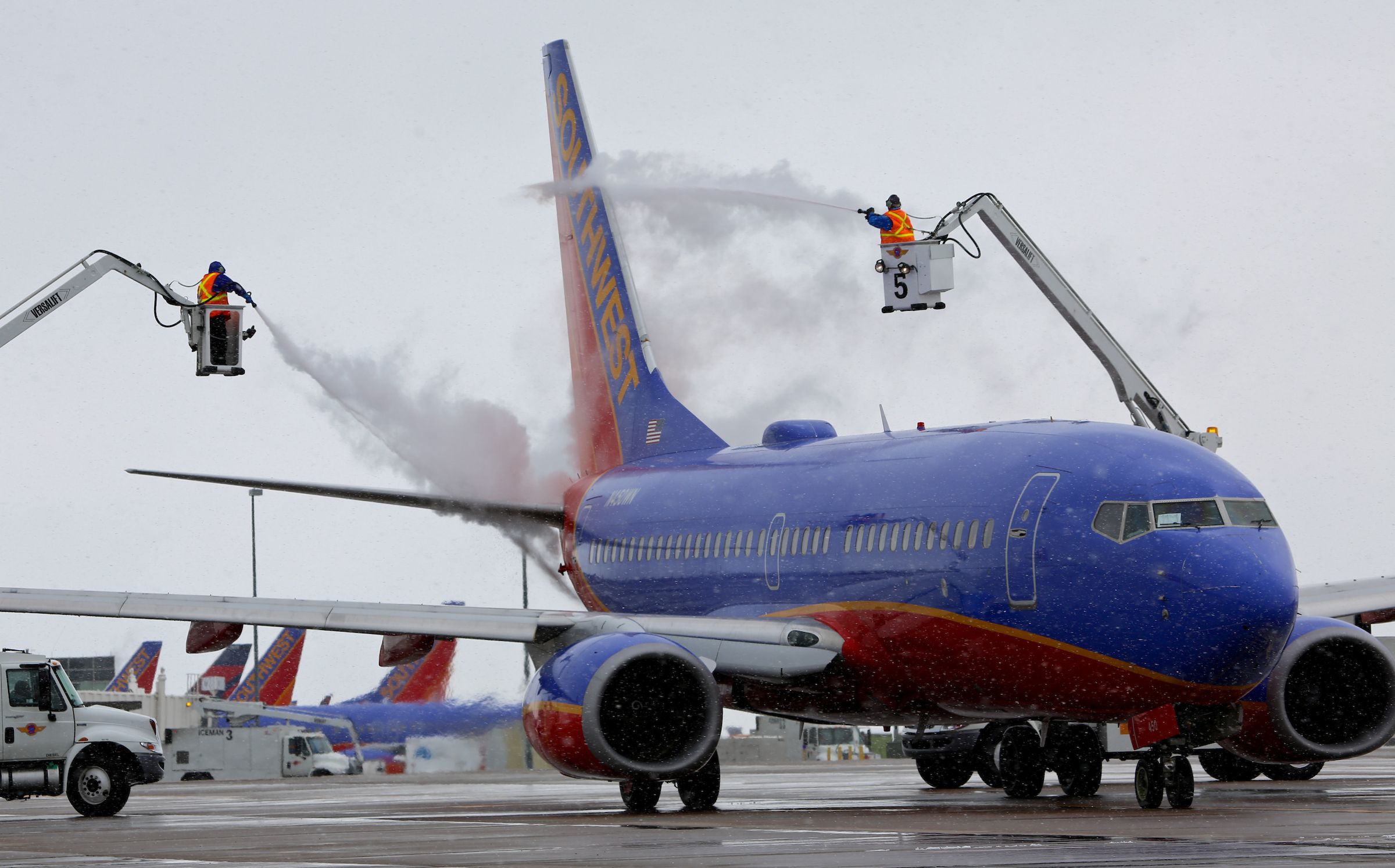 Snow Removal-321 - De-Icing A Southwest Airlines 737 at DEN