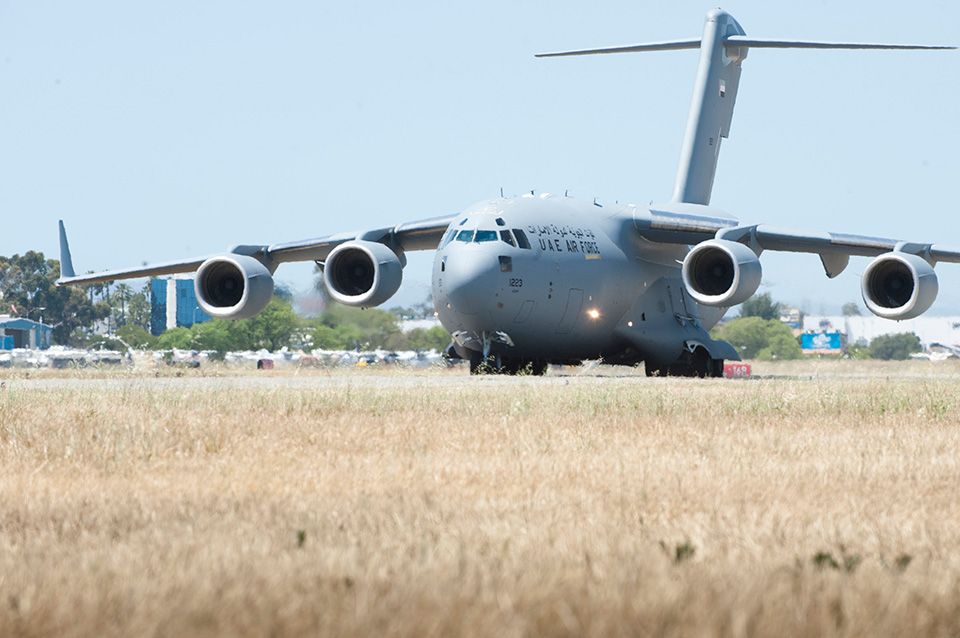 A UAE C-17 taxiing at an airfield.