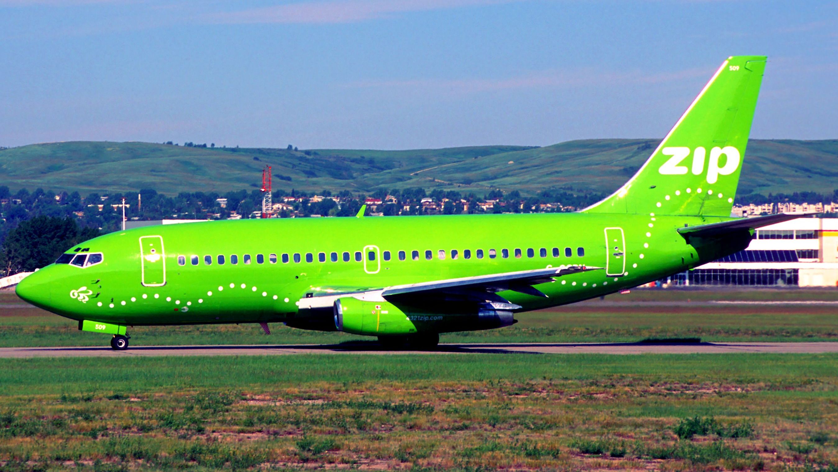 A Zip Boeing 737-200 taxiing to the runway.
