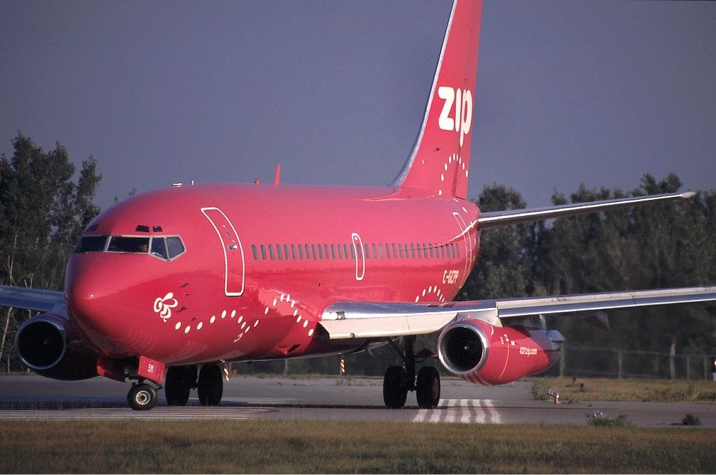 A Zip Boeing 737-200 taxiing to the runway.
