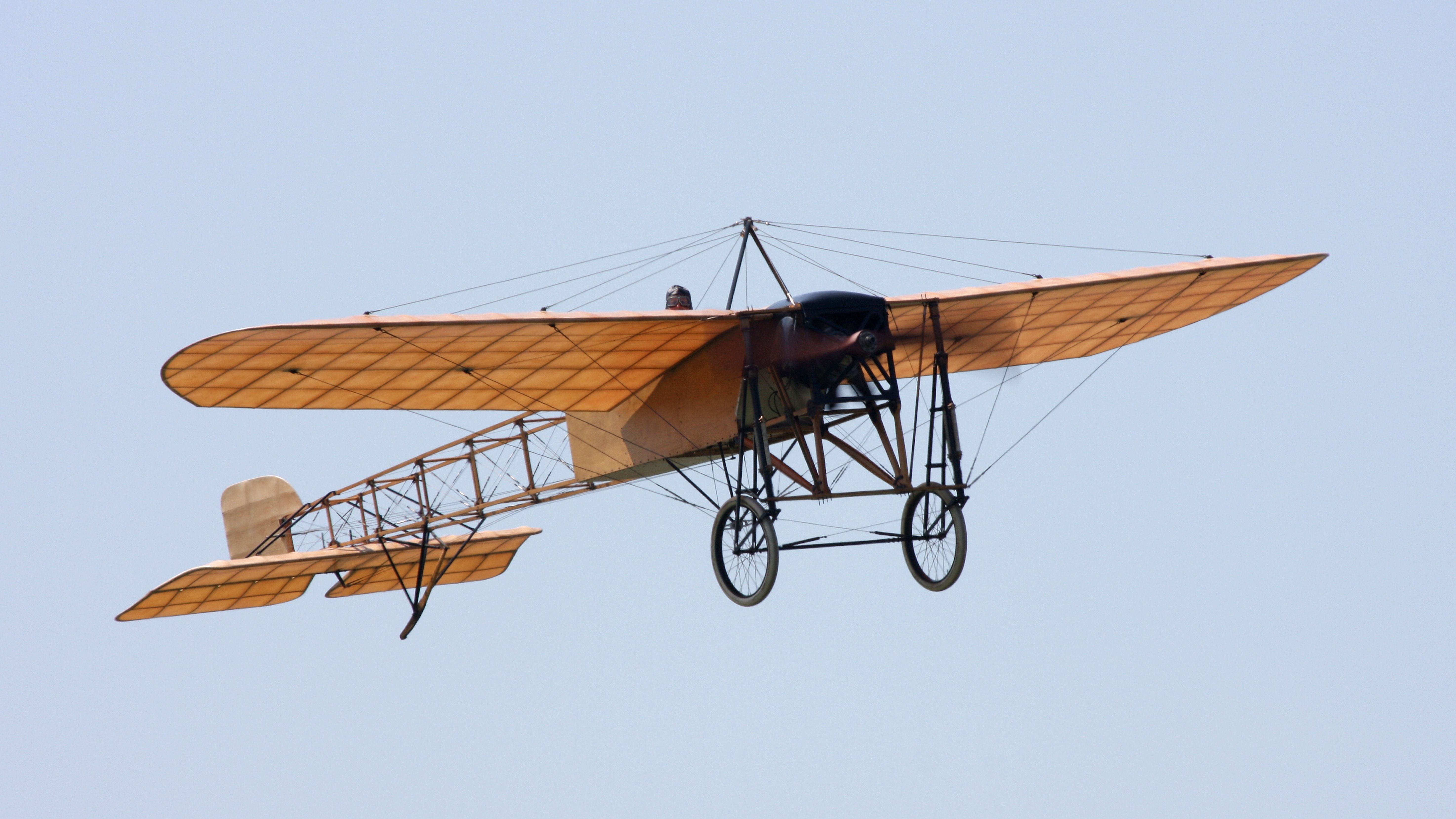 A Bleriot XI flying in the sky.
