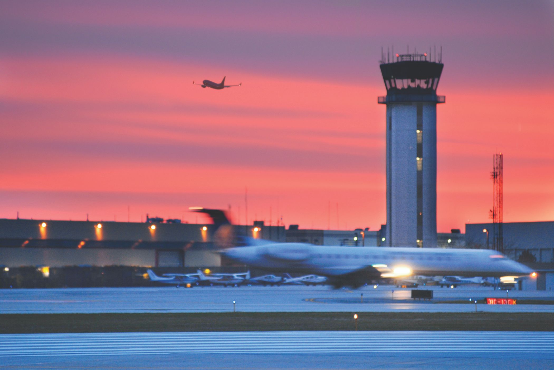 A panoramic view of Chicago Midway Airport at dusk.