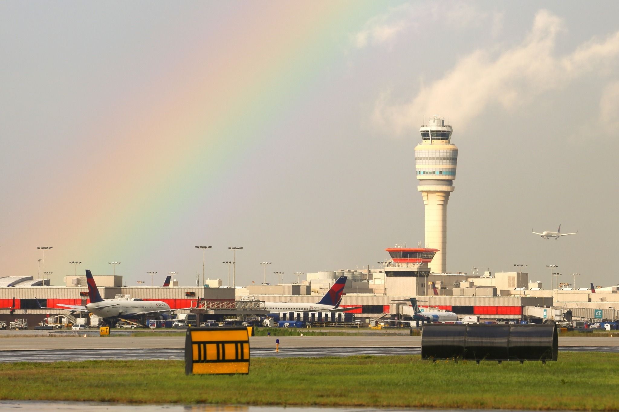 A Rainbow seen in the background of Hartsfield-Jackson Atlanta International Airport.