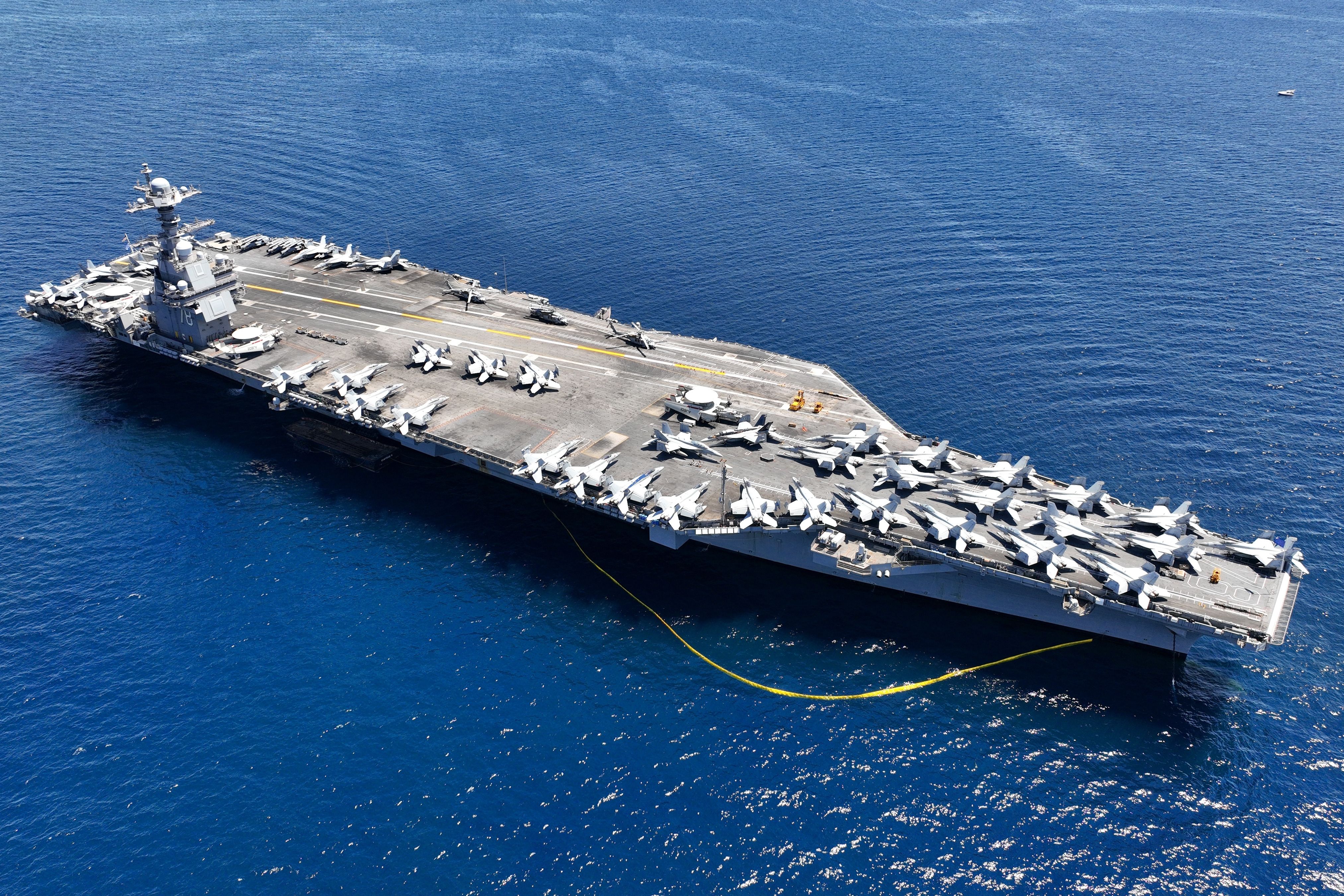 An aerial view of the USS Gerald Ford in the water.