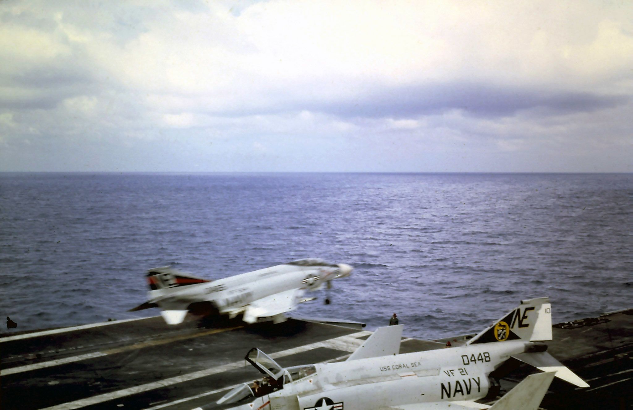 A McDonnell Douglas F-4 Phantom II taking off from an aircraft carrier.
