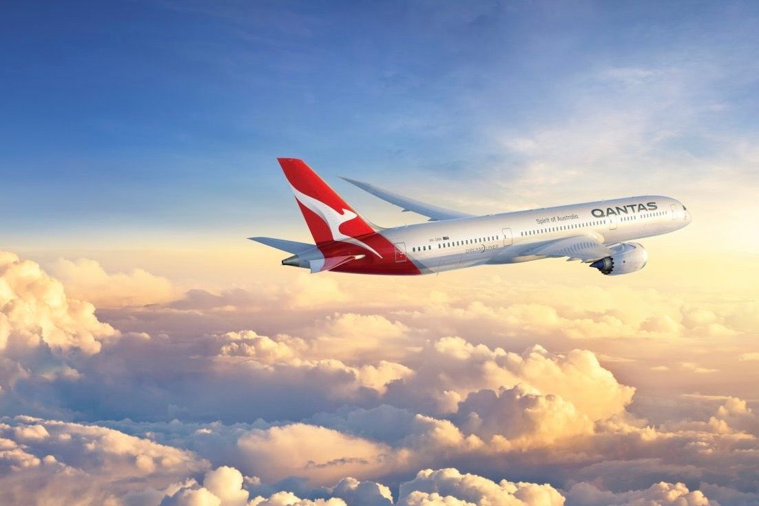 A Qantas Boeing 787 Dreamliner above the clouds.