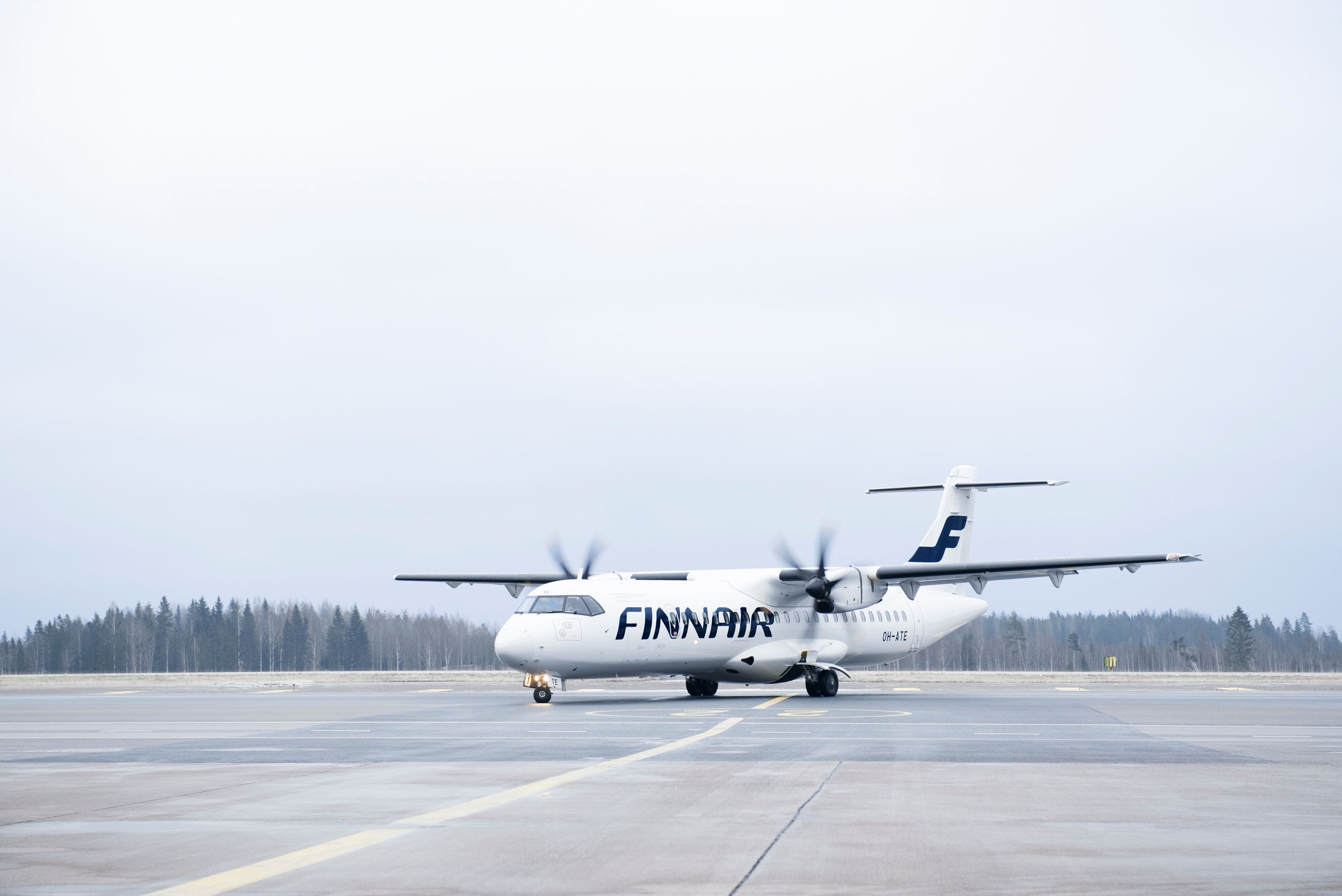 Finnair ATR 72 taxiing at the airport.