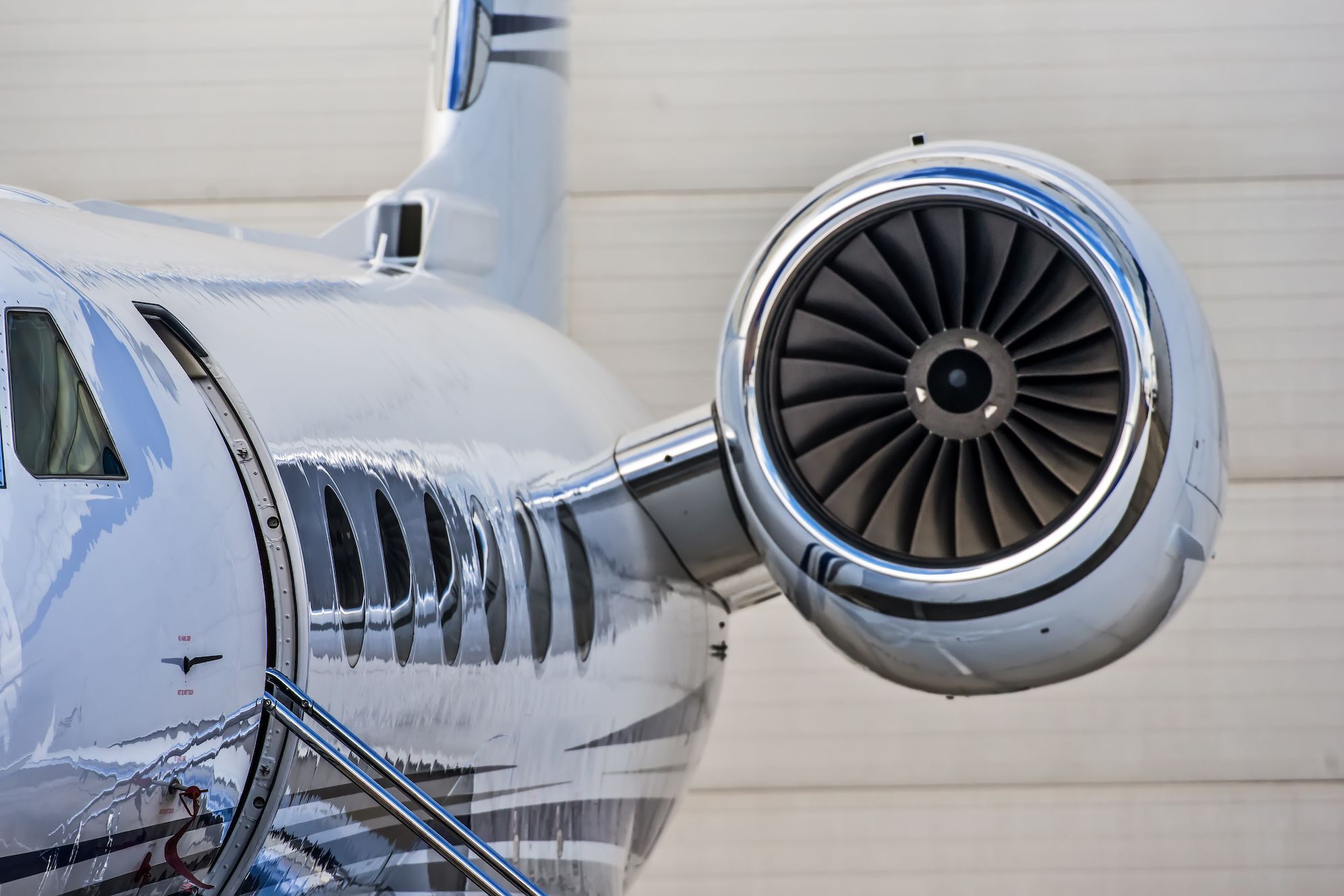 A close-up of a private jet engine.