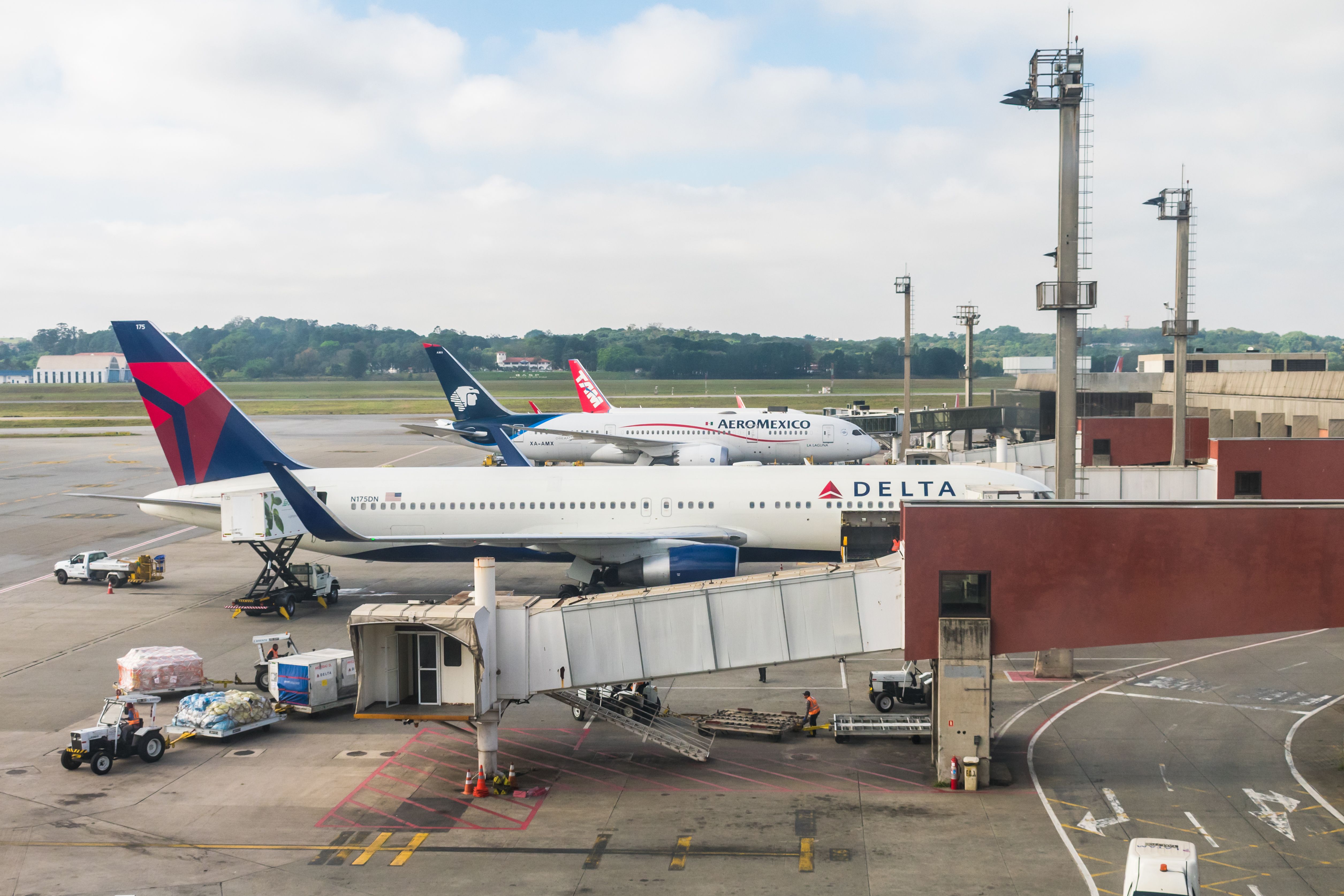 A Delta Air Lines, an Aeromexico, and a LATAM Brasil aicraft parket in GRU