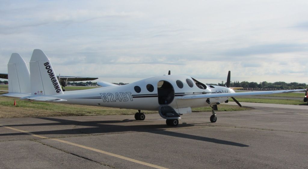 A Rutan Model 202 Boomerang parked at an airfield.