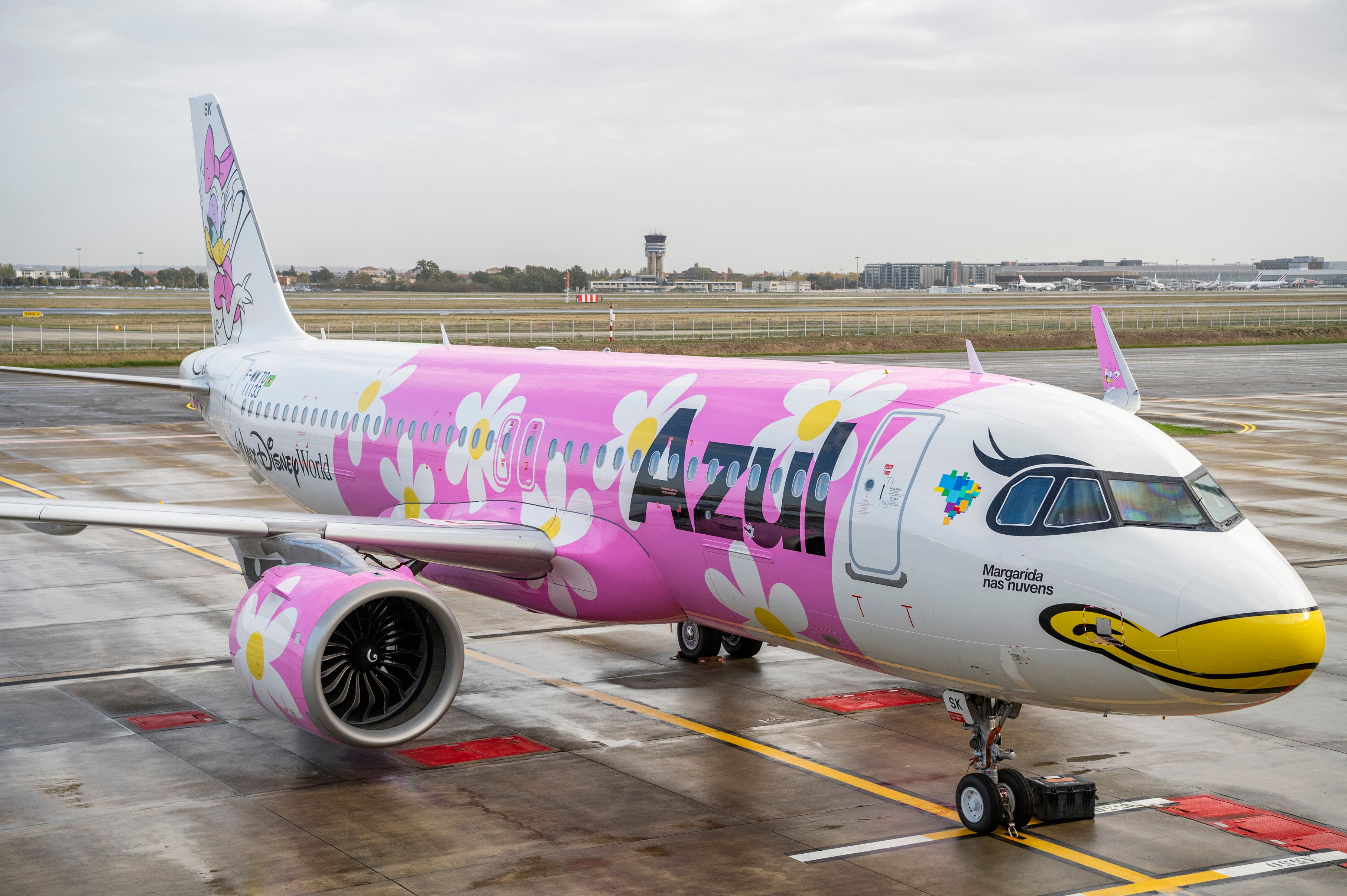 An Azul Linhas Aircraft painted with a Daisy Duck livery