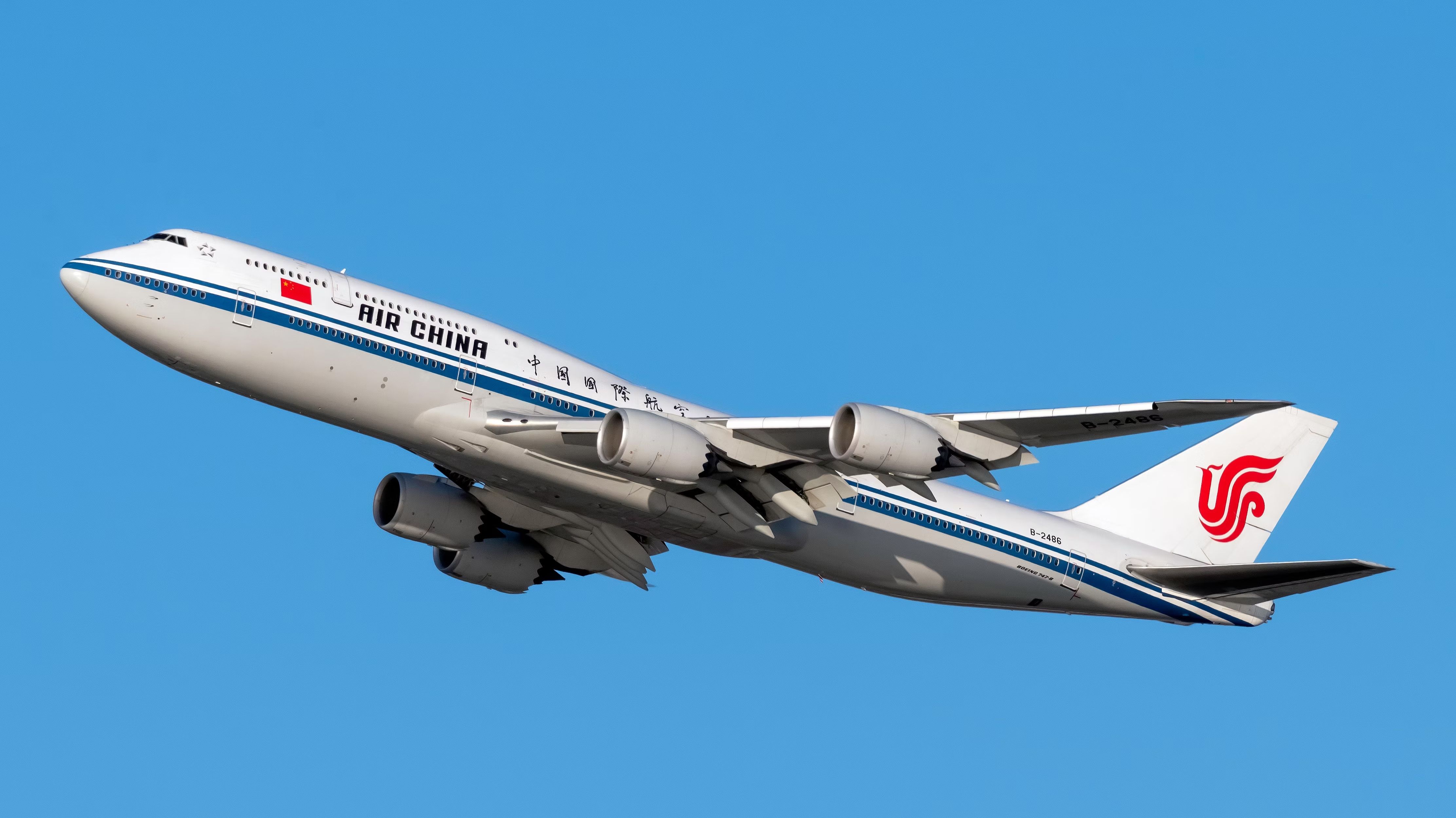 An Air China Boeing 747 flying in the sky.