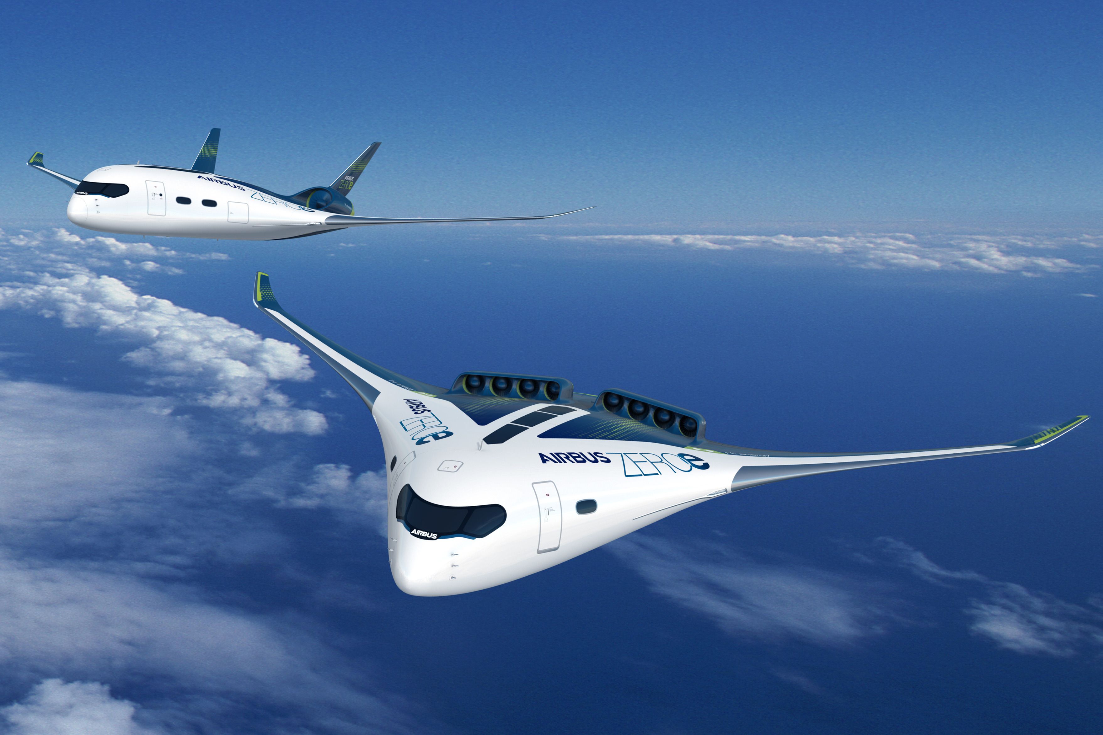 Two Airbus ZeroE Blended wing Concept aircraft flying in the sky.