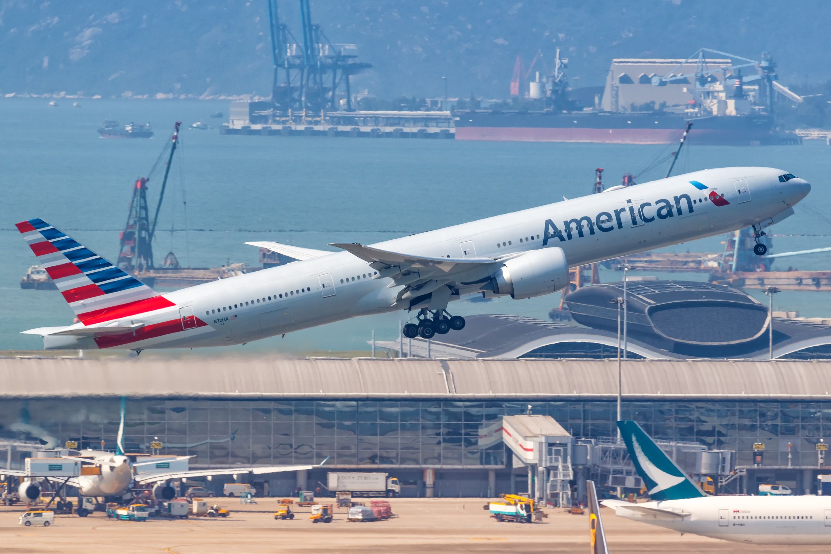 An American Airlines Boeing 777 departing Hong Kong International Airport.