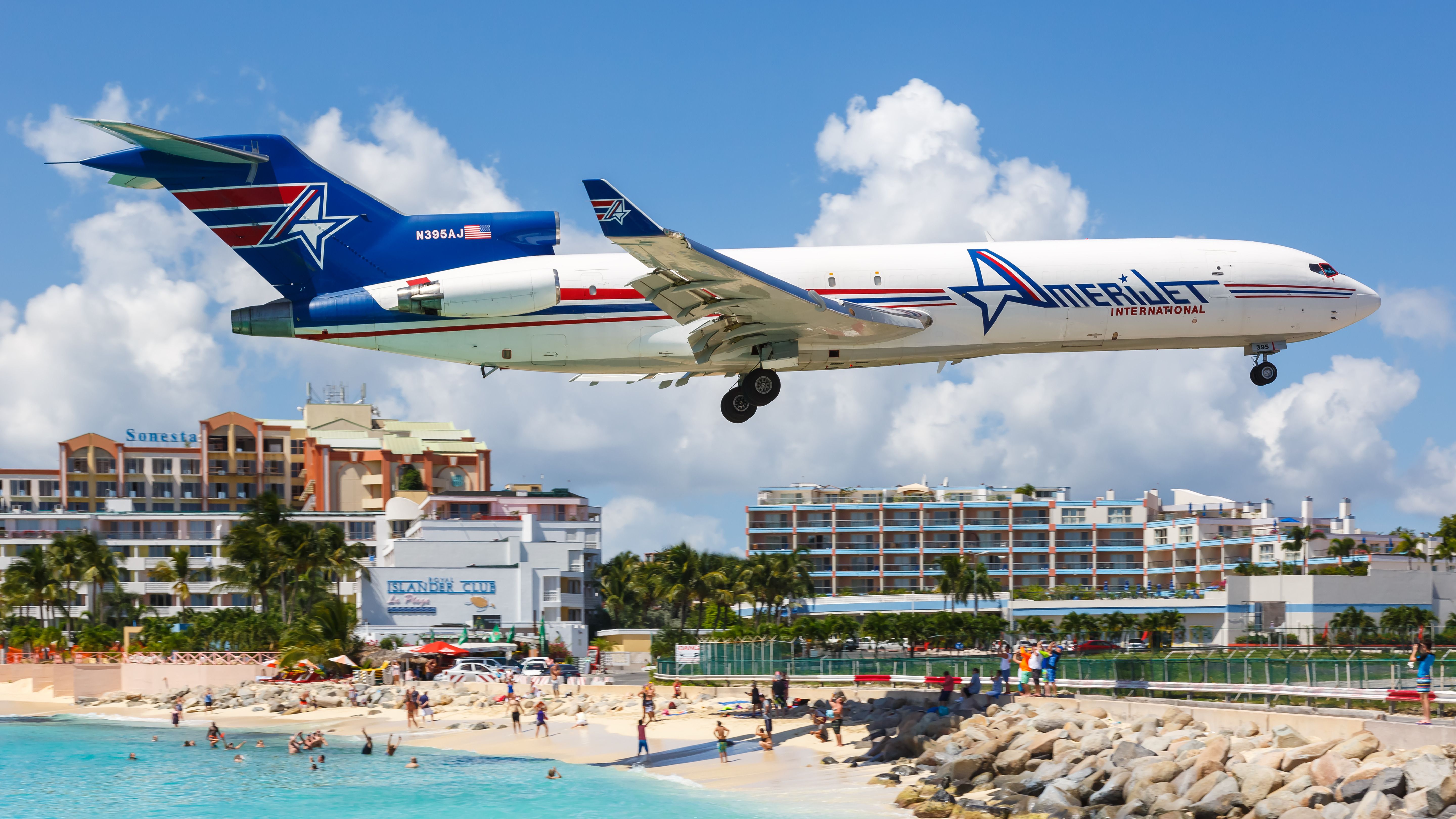 An Amerijet Boeing 727-200F airplane landing in Sint Maarten.