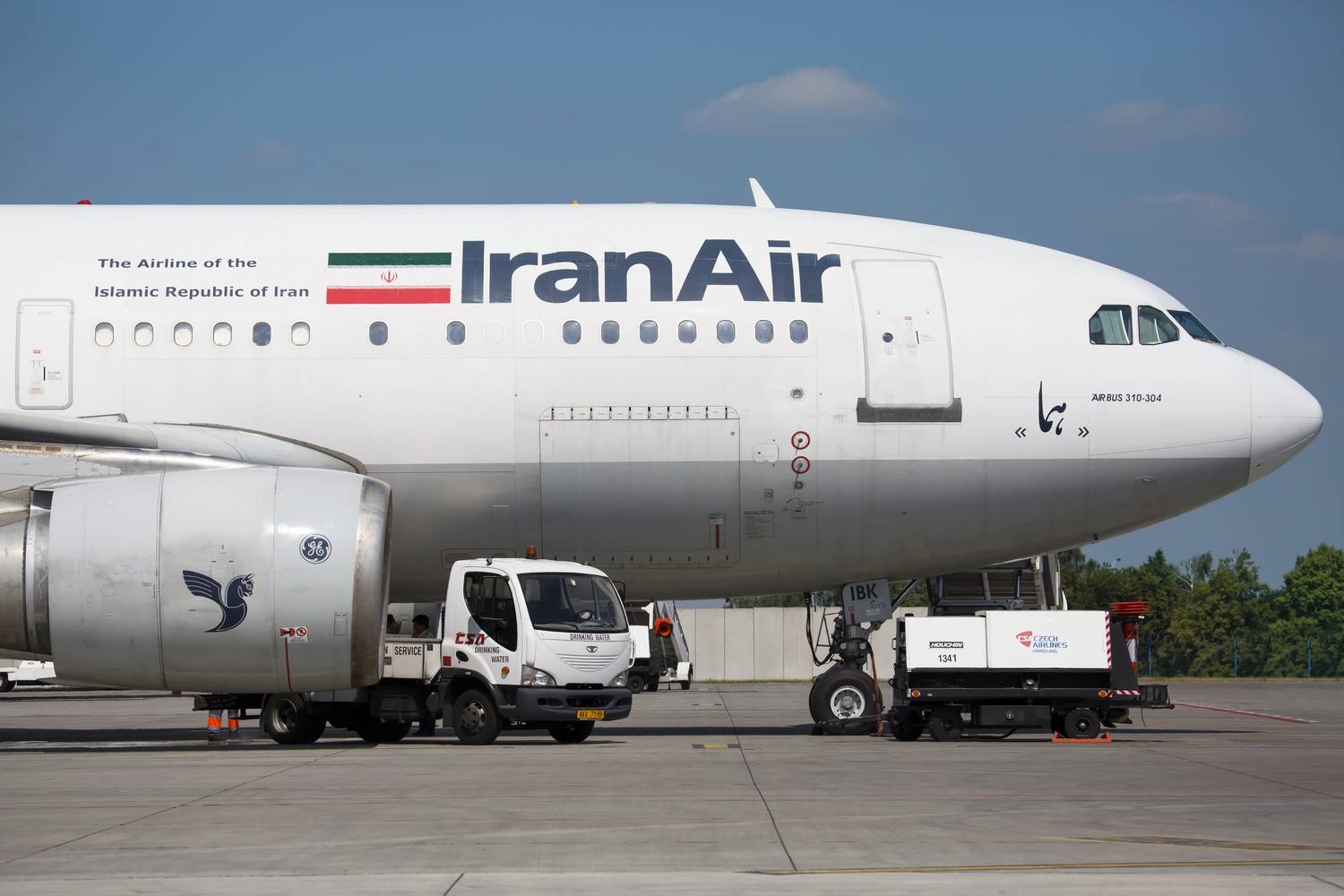 An IranAir Airbus A310 parked at an airport.